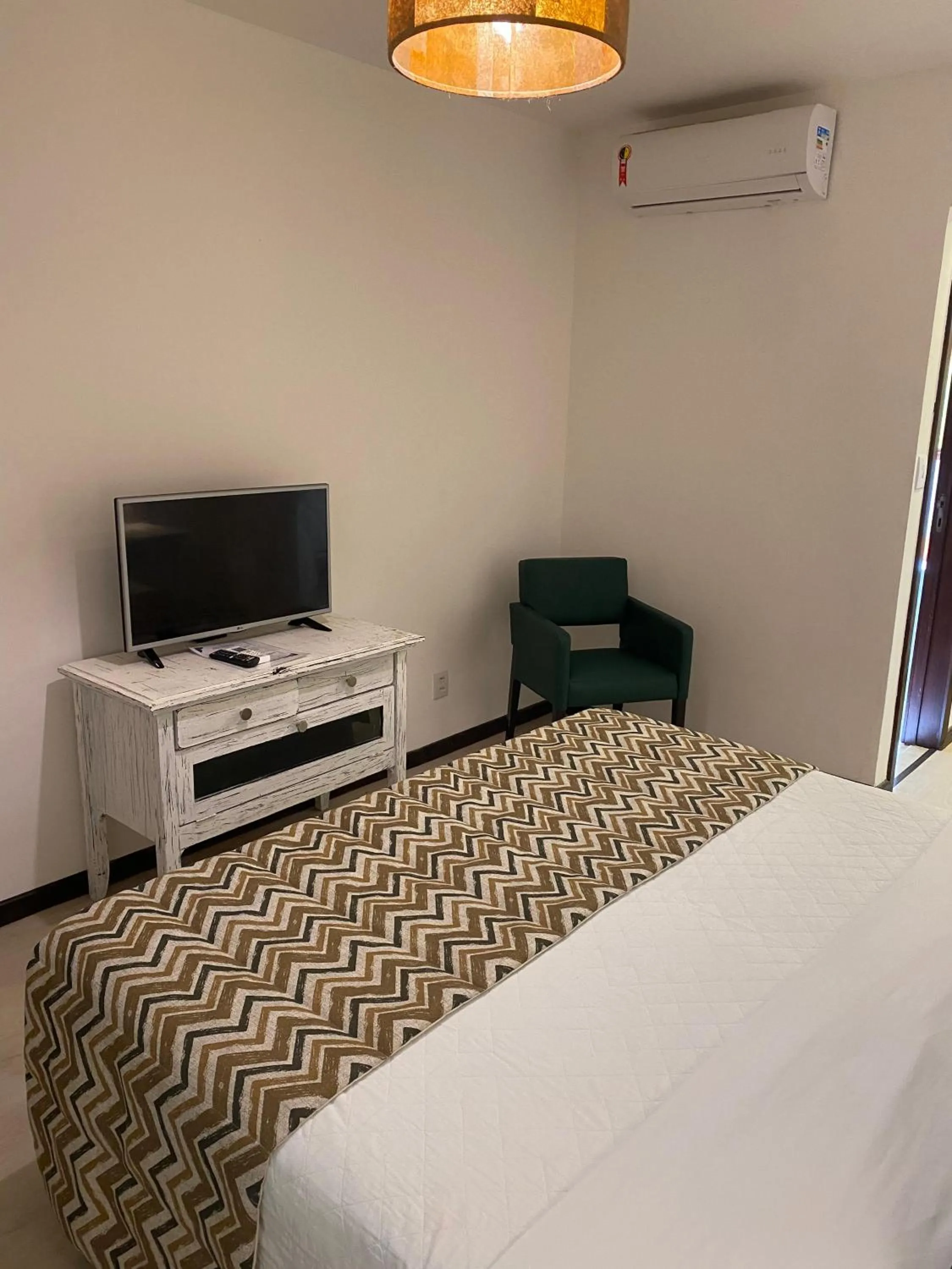 Bed in Girassóis Suítes