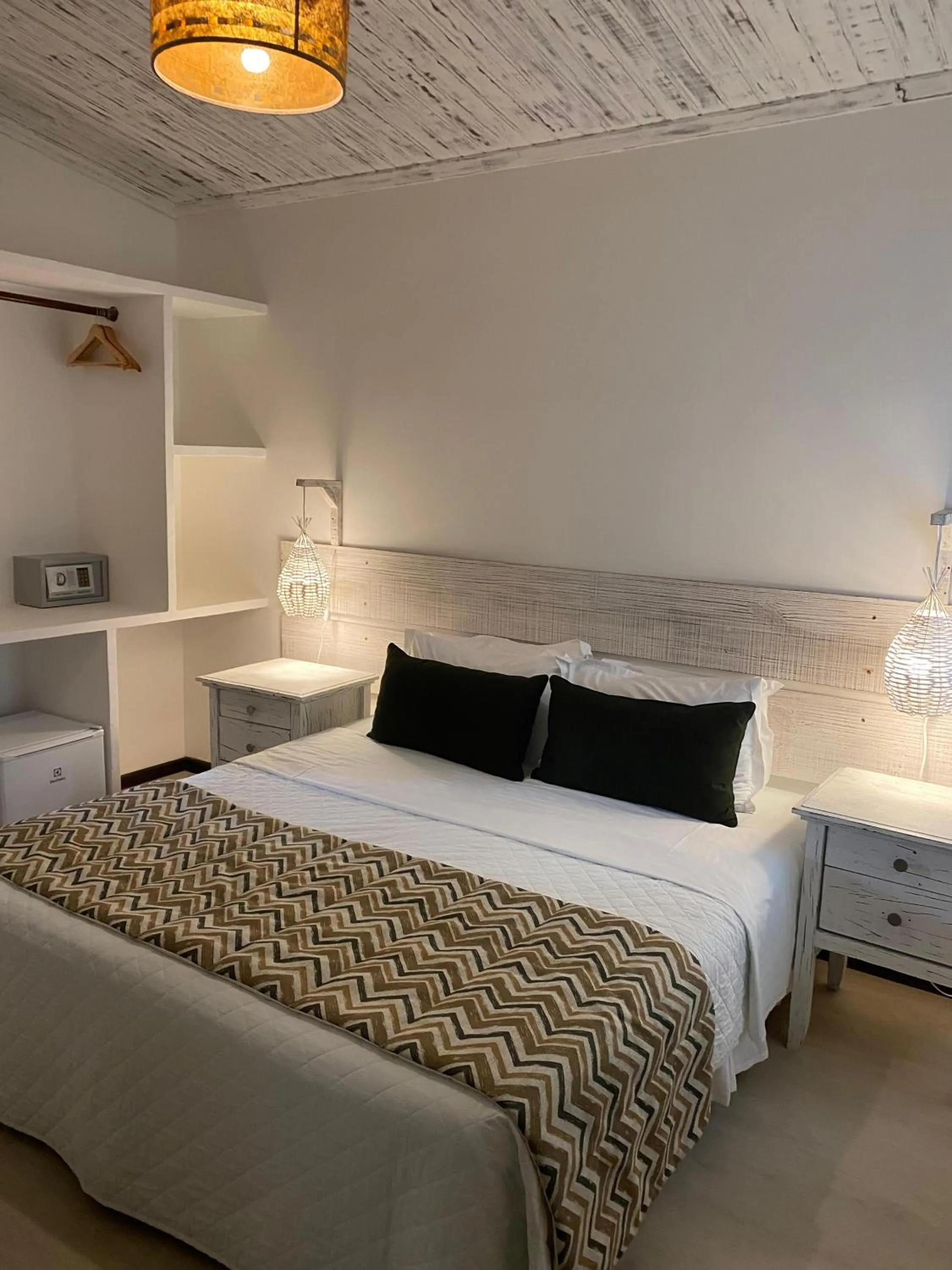 Bed in Girassóis Suítes