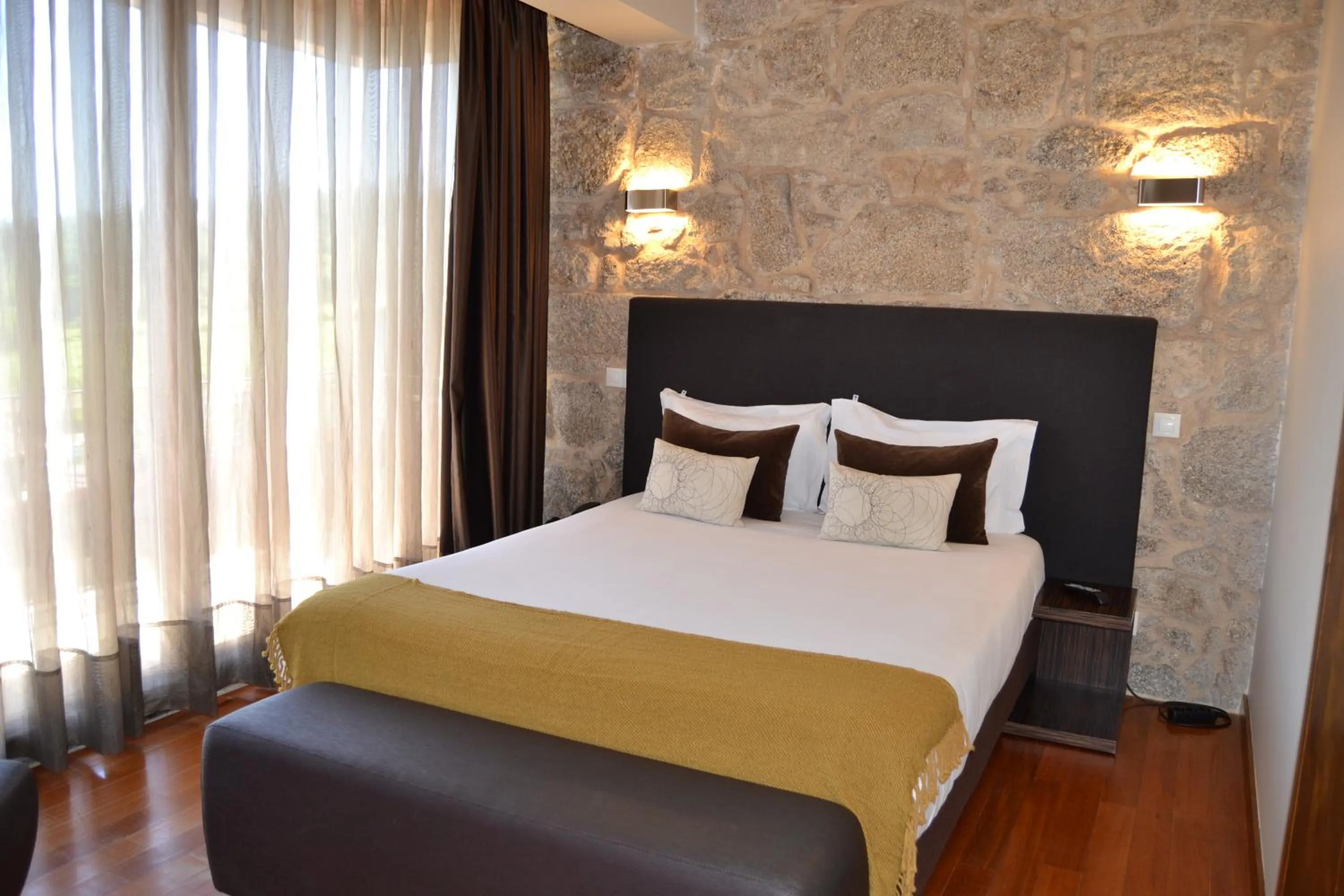 Bed in Quinta do Medronheiro Hotel Rural