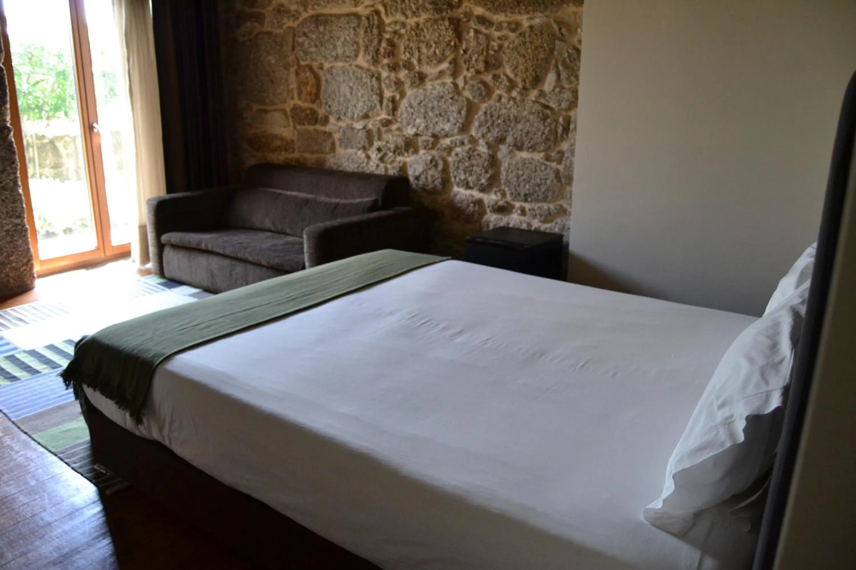 Bed in Quinta do Medronheiro Hotel Rural