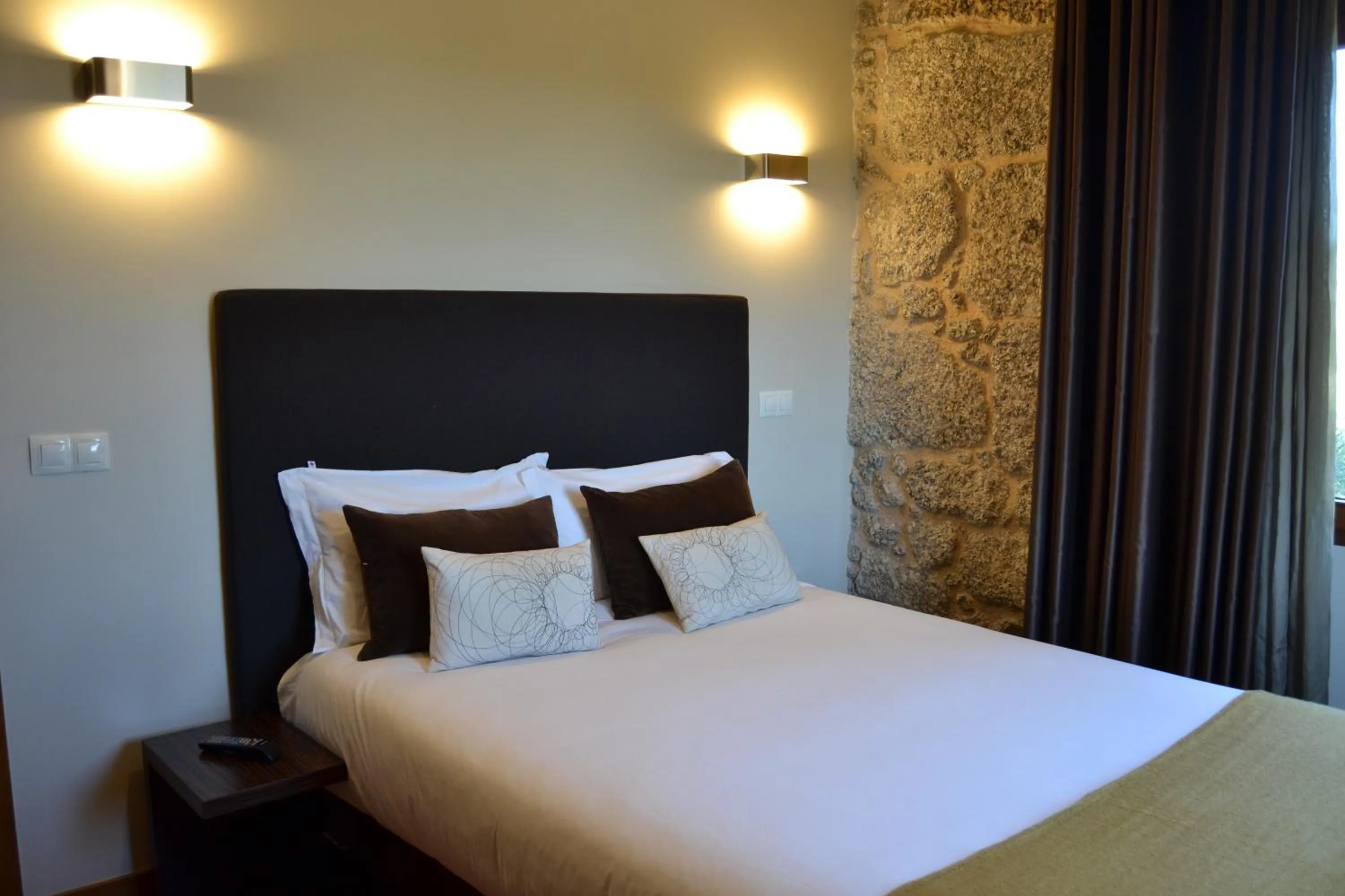 Bed in Quinta do Medronheiro Hotel Rural