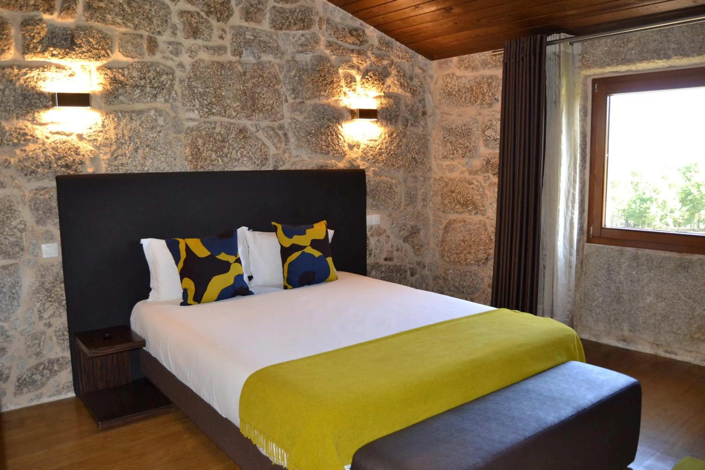 Bed in Quinta do Medronheiro Hotel Rural