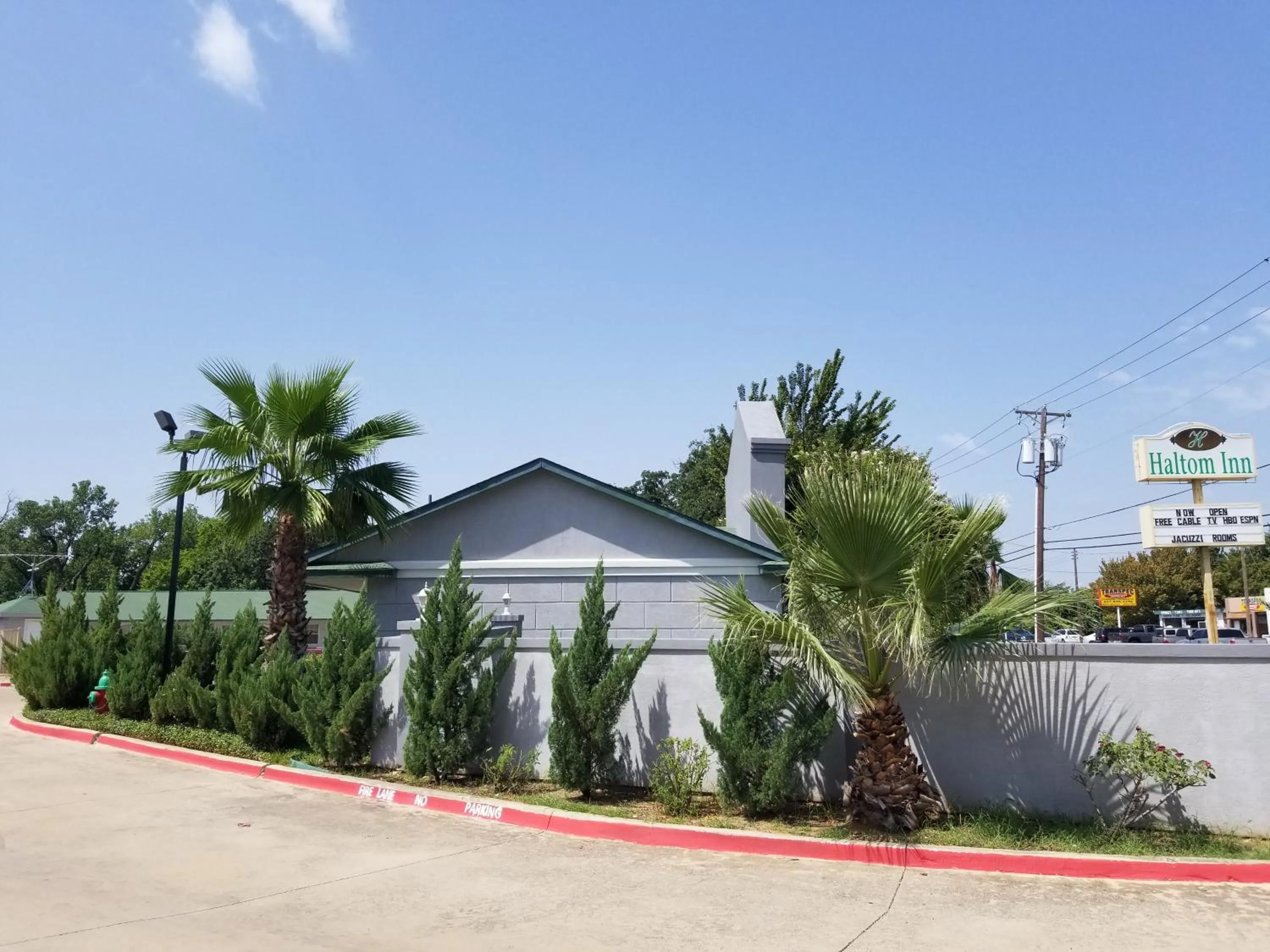 Property logo or sign in Haltom Inn Fort Worth
