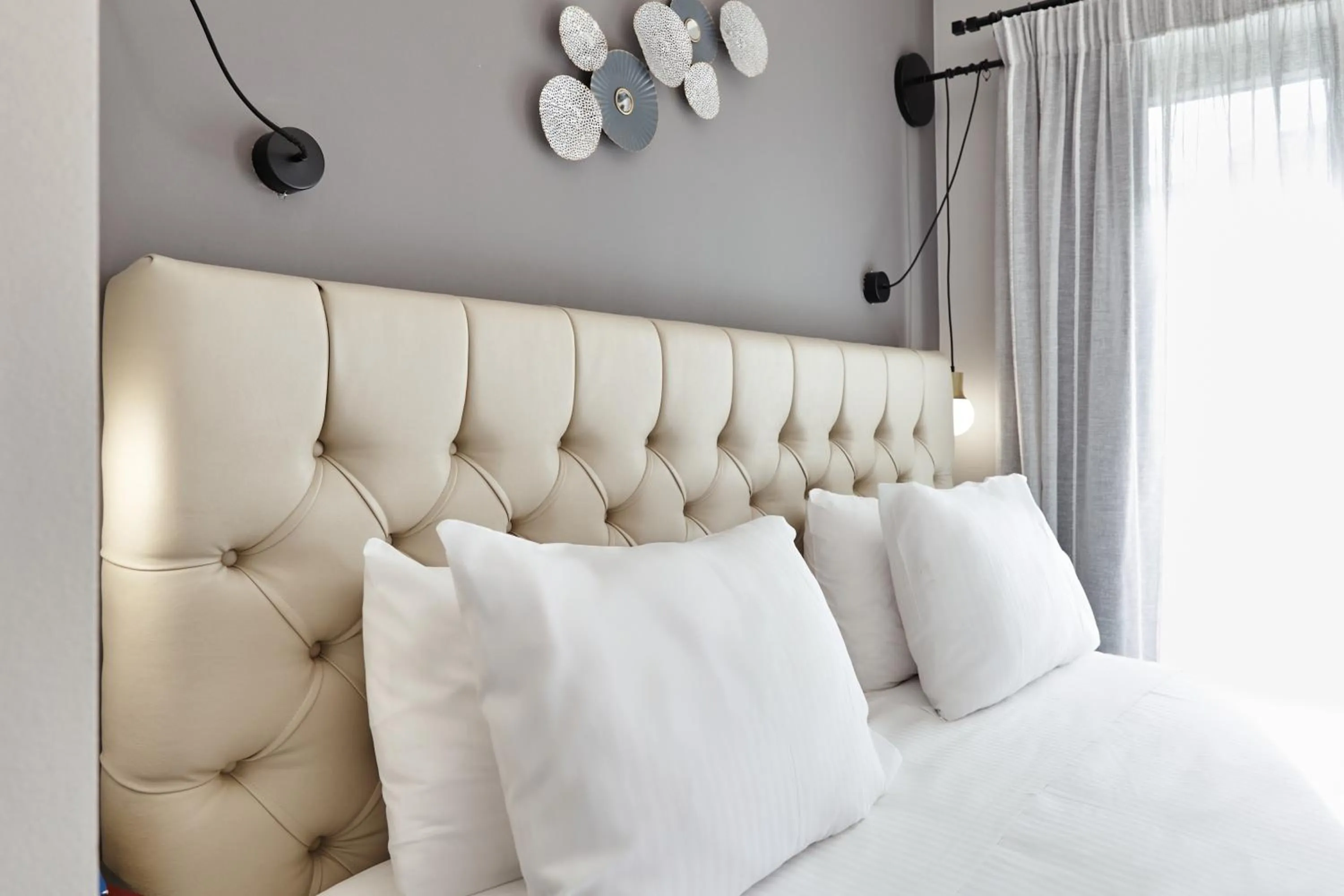 Bed in Nival Luxury Suites