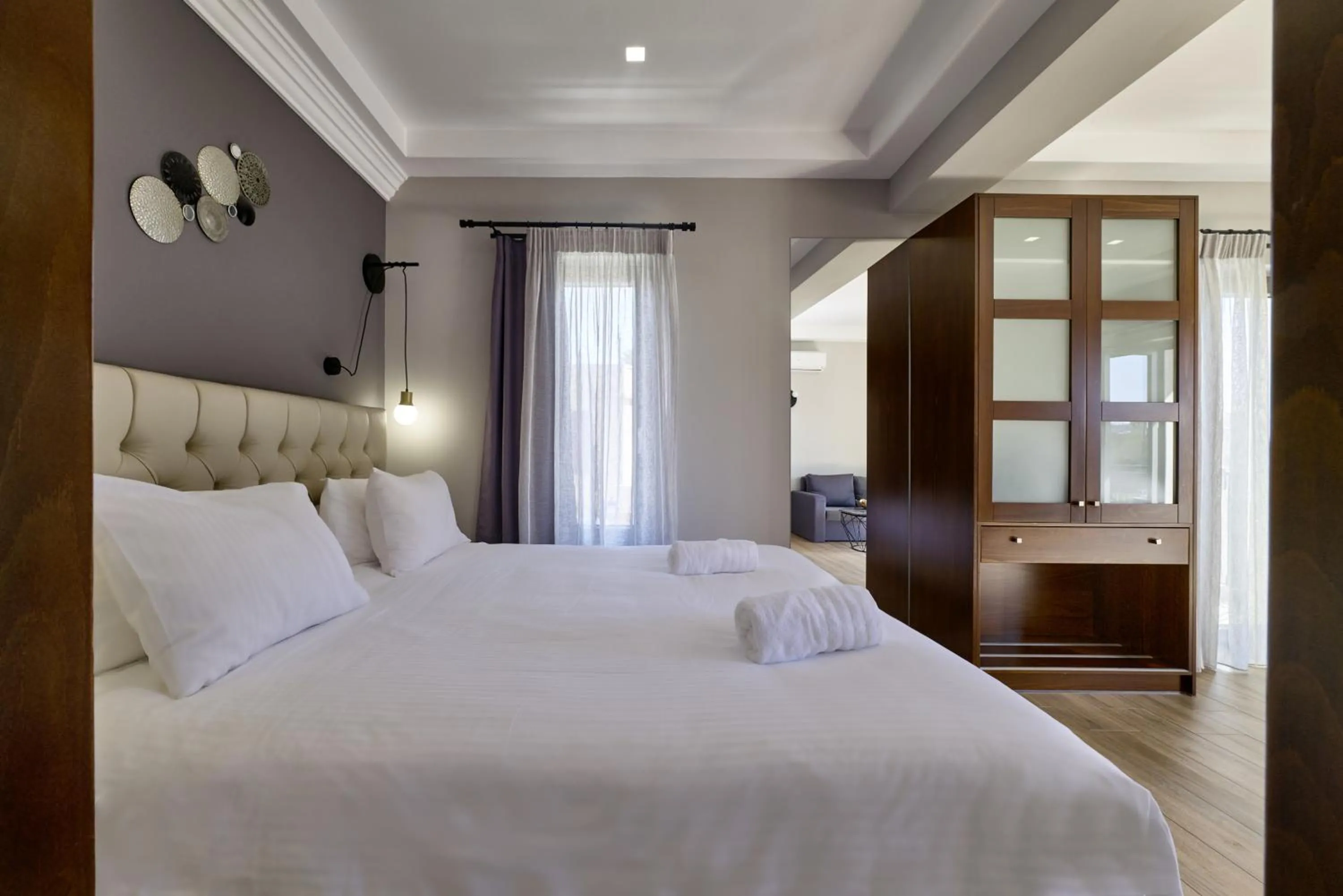 Bed in Nival Luxury Suites