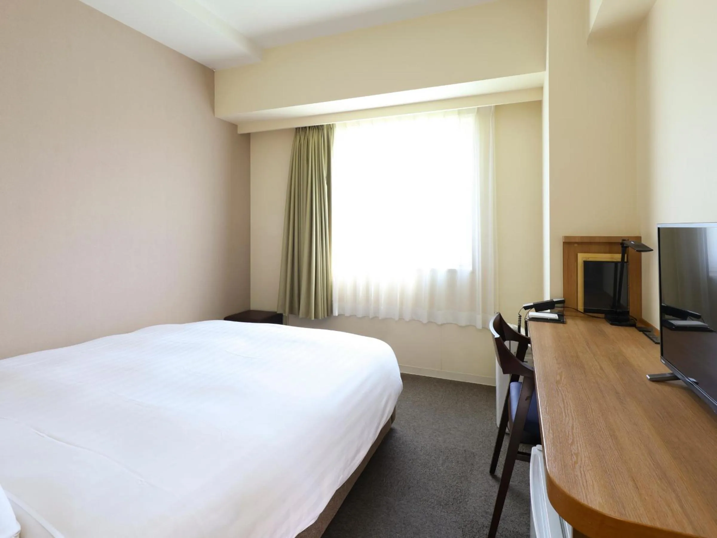 Photo of the whole room, Bed in Dormy Inn Express Mikawaanjo