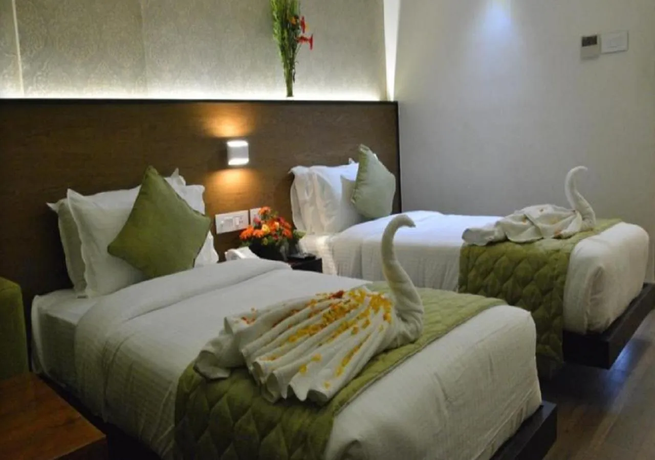 Bed in Hotel Sree Annamalaiyar Park