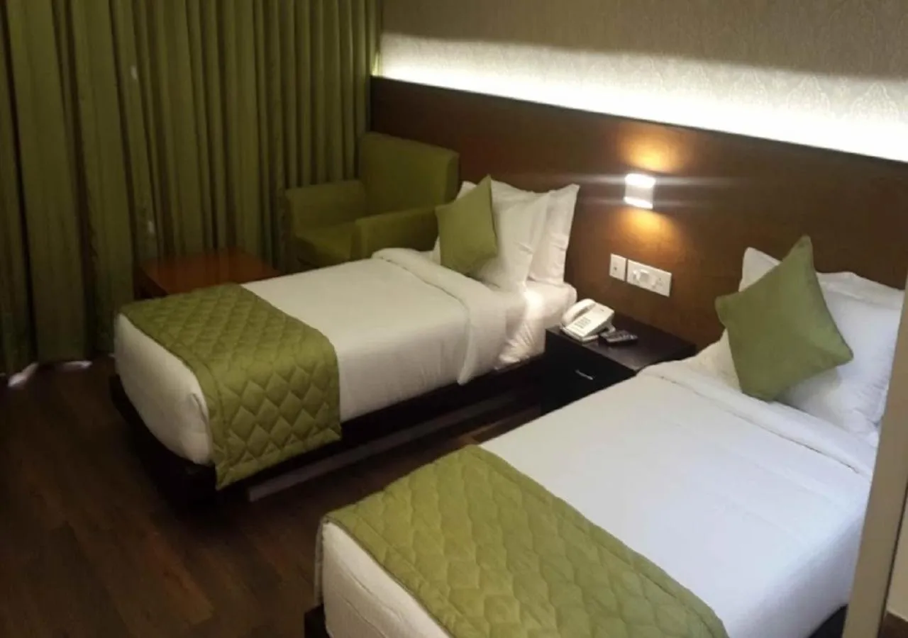 Bed in Hotel Sree Annamalaiyar Park