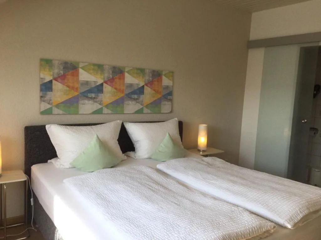 Bed in Gästehaus Am Rebenhang