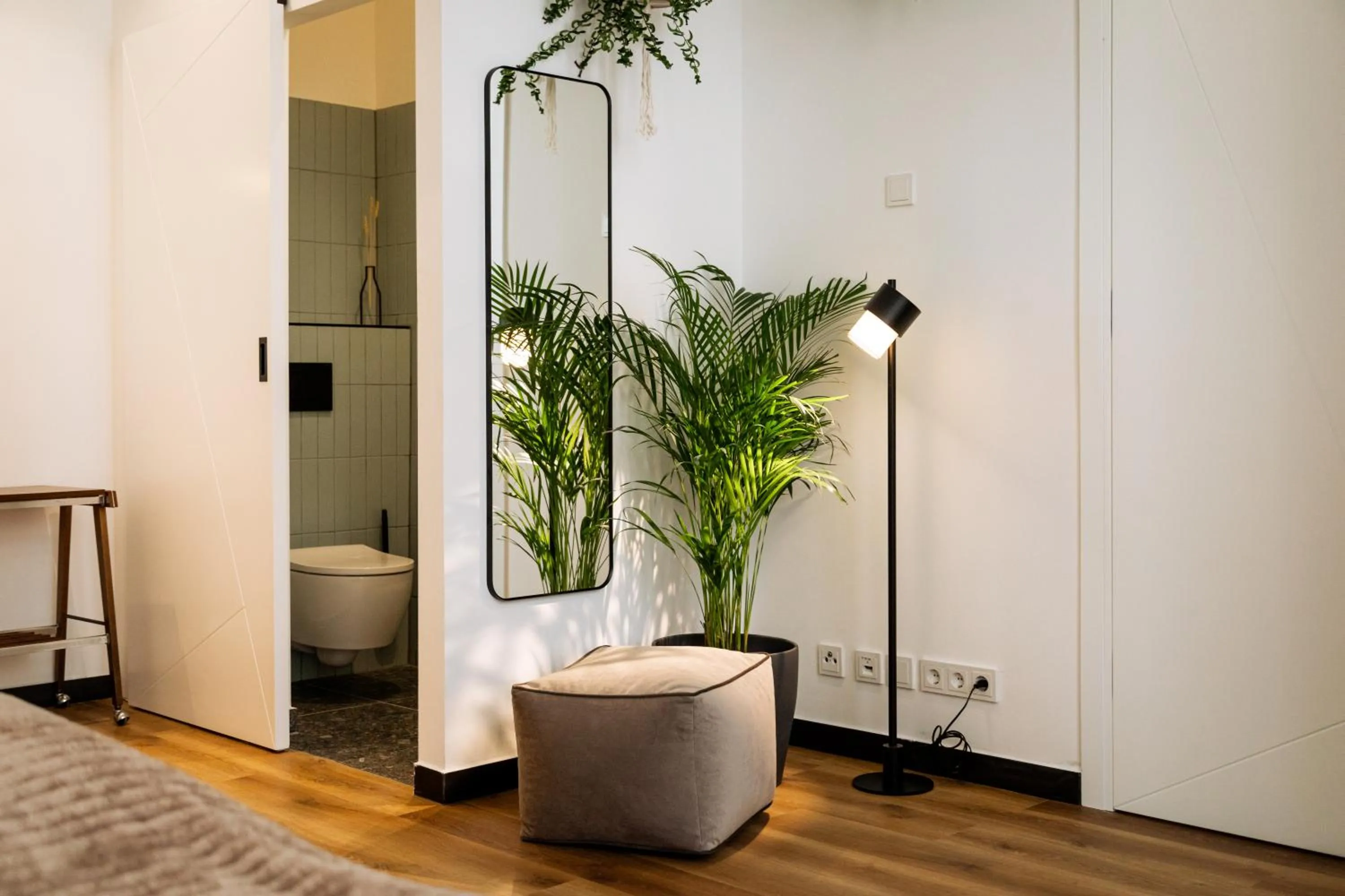 Toilet in Urban Jungle Apartments