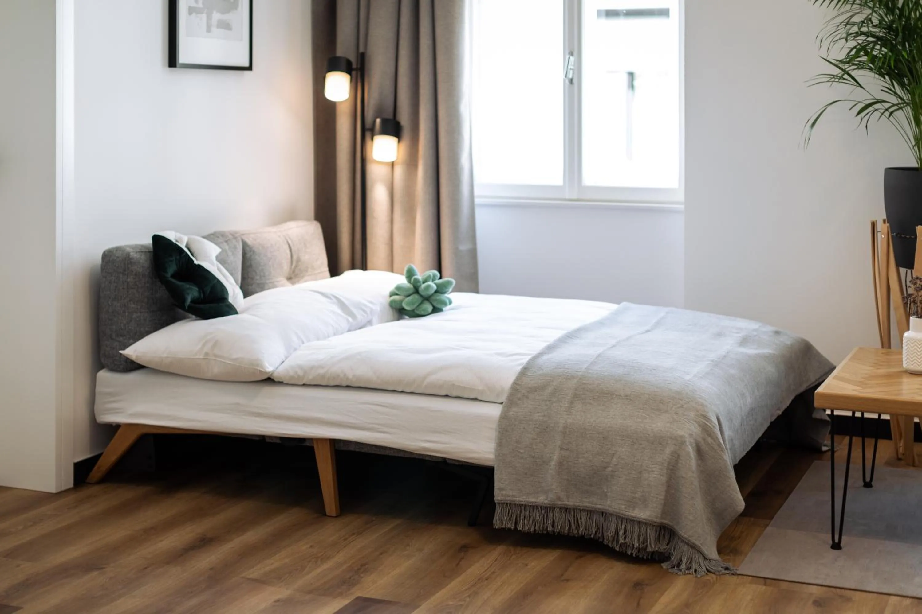 Bed in Urban Jungle Apartments