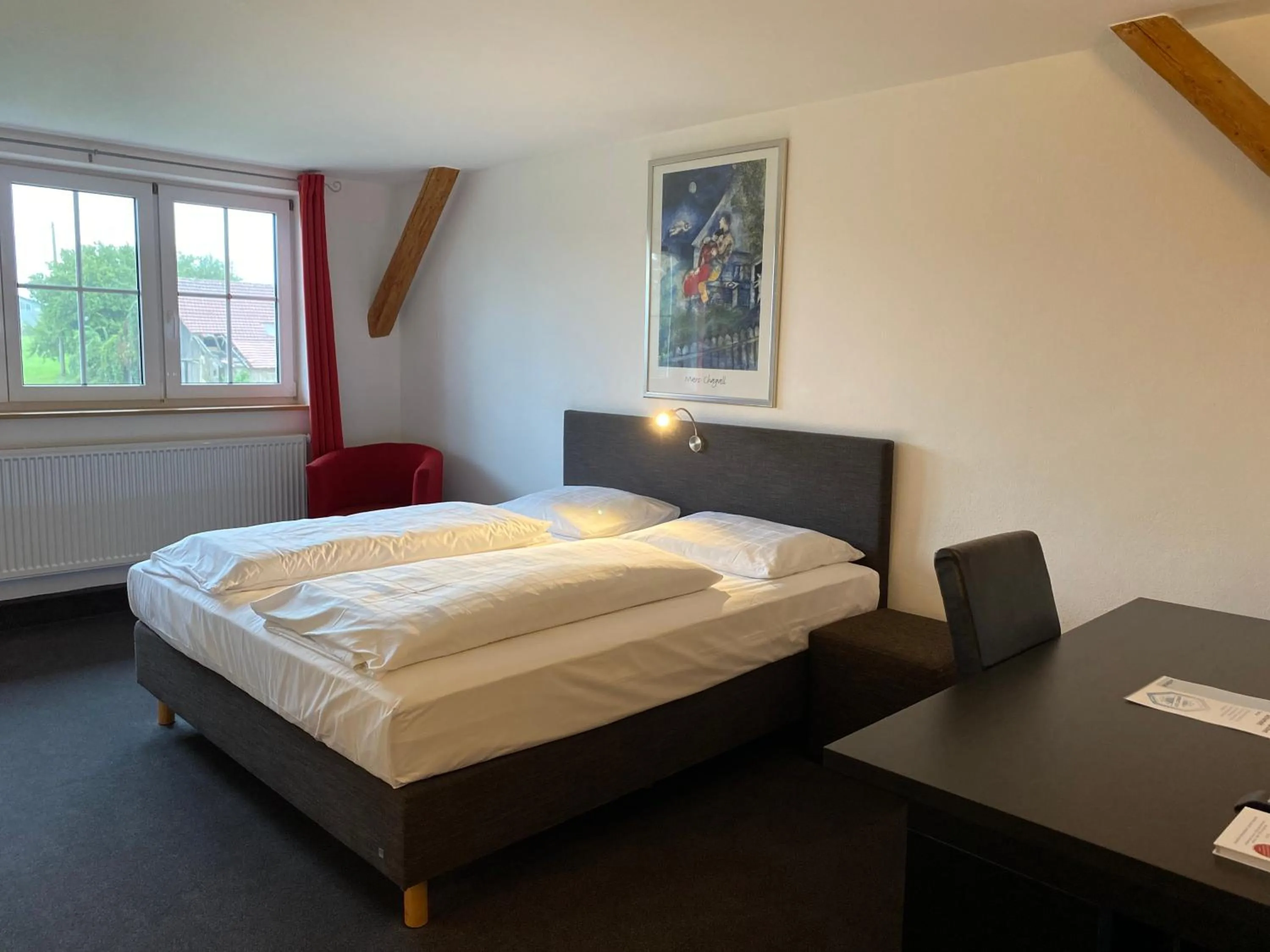 Photo of the whole room, Bed in Landhotel Zerlaut