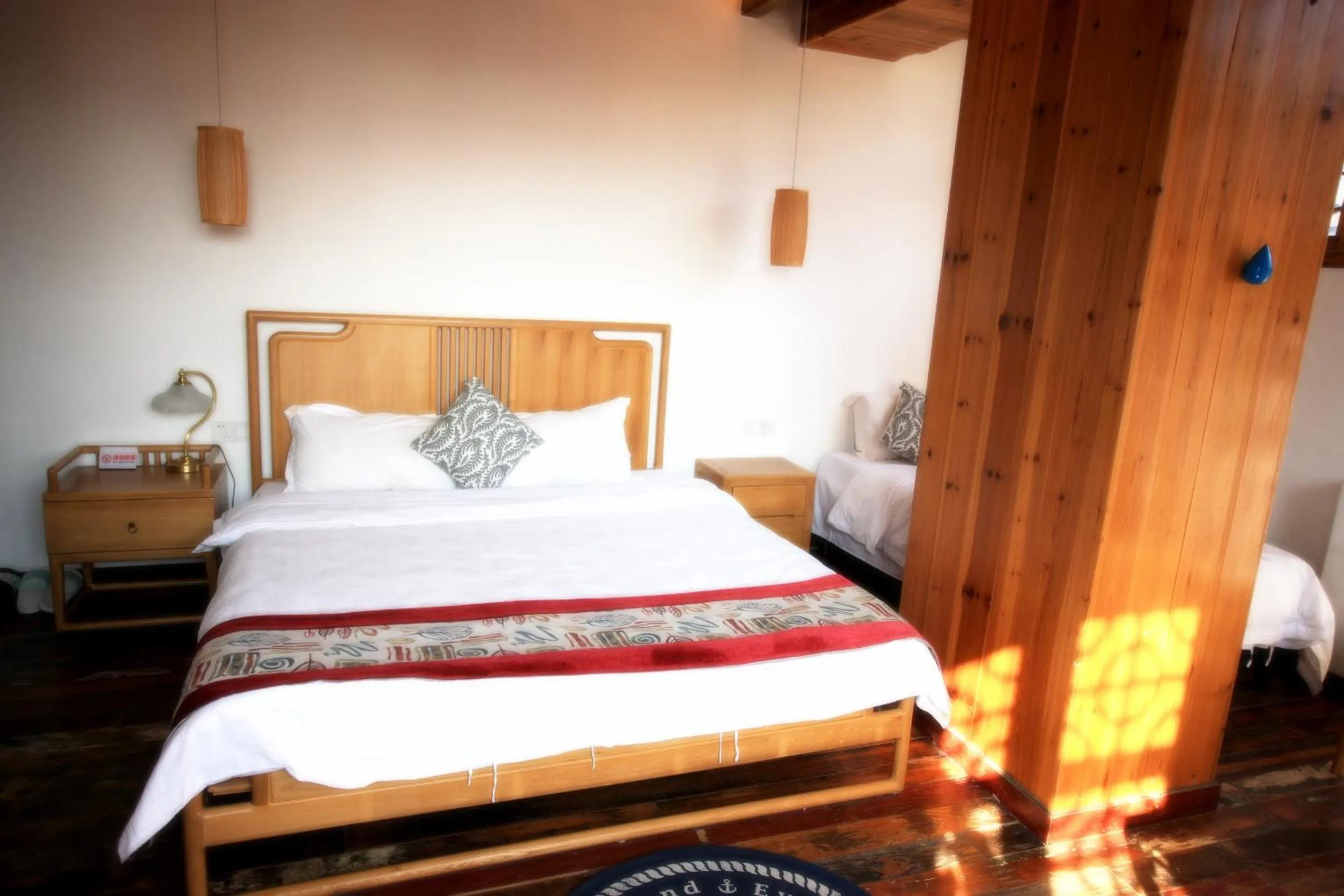 Decorative detail, Bed in Tongli Begonia Flowers Guesthouse