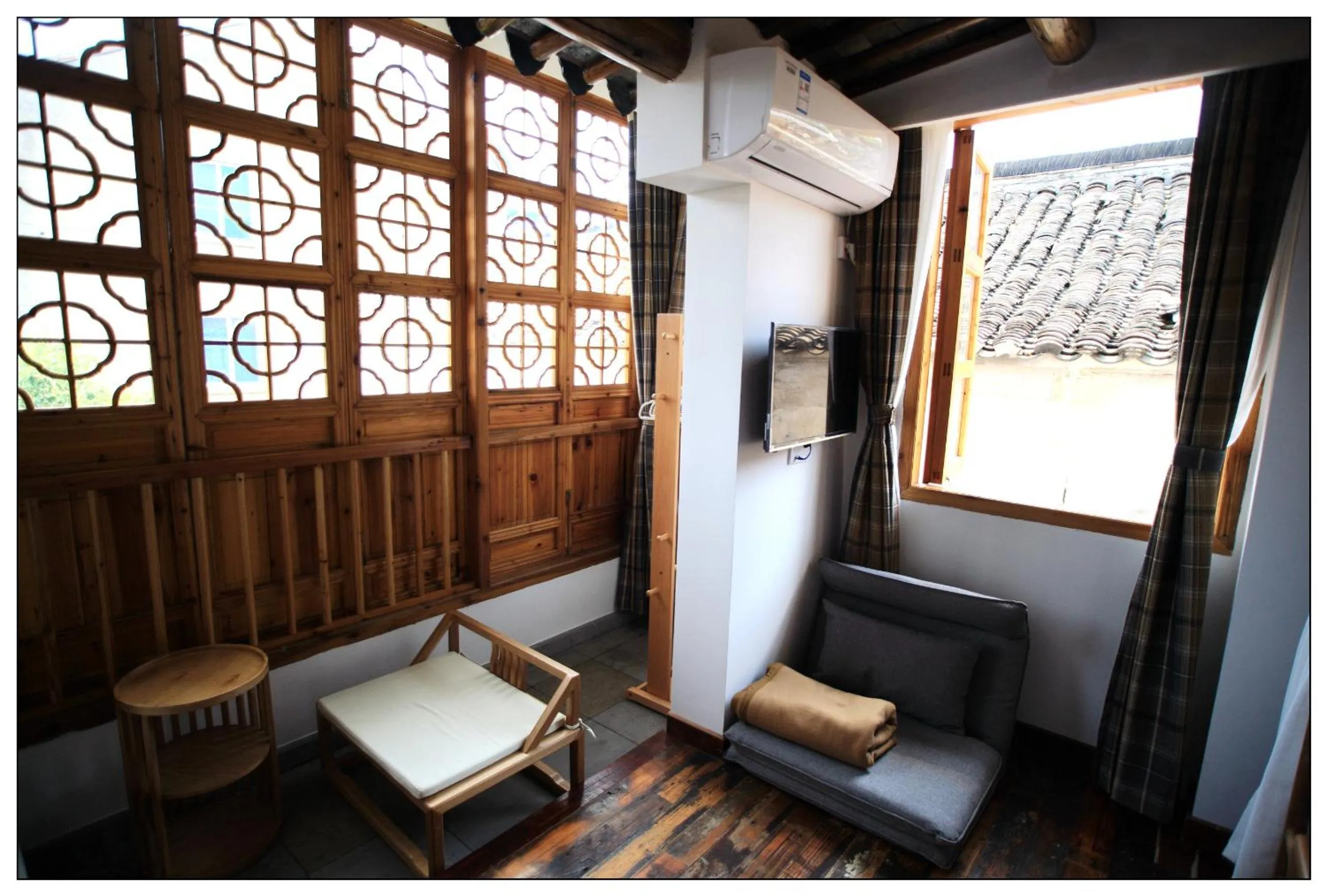Seating area in Tongli Begonia Flowers Guesthouse
