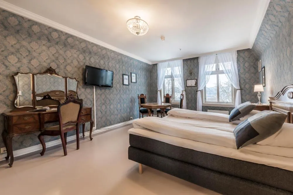 Photo of the whole room, Bed in Gloppen Hotell - by Classic Norway Hotels