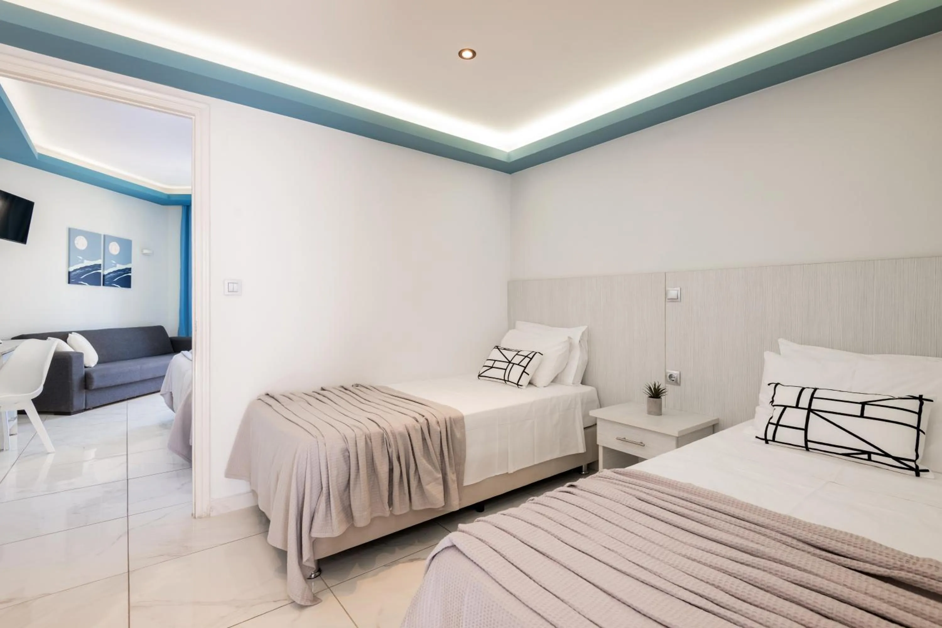 Seating area, Bed in Callinica Hotel