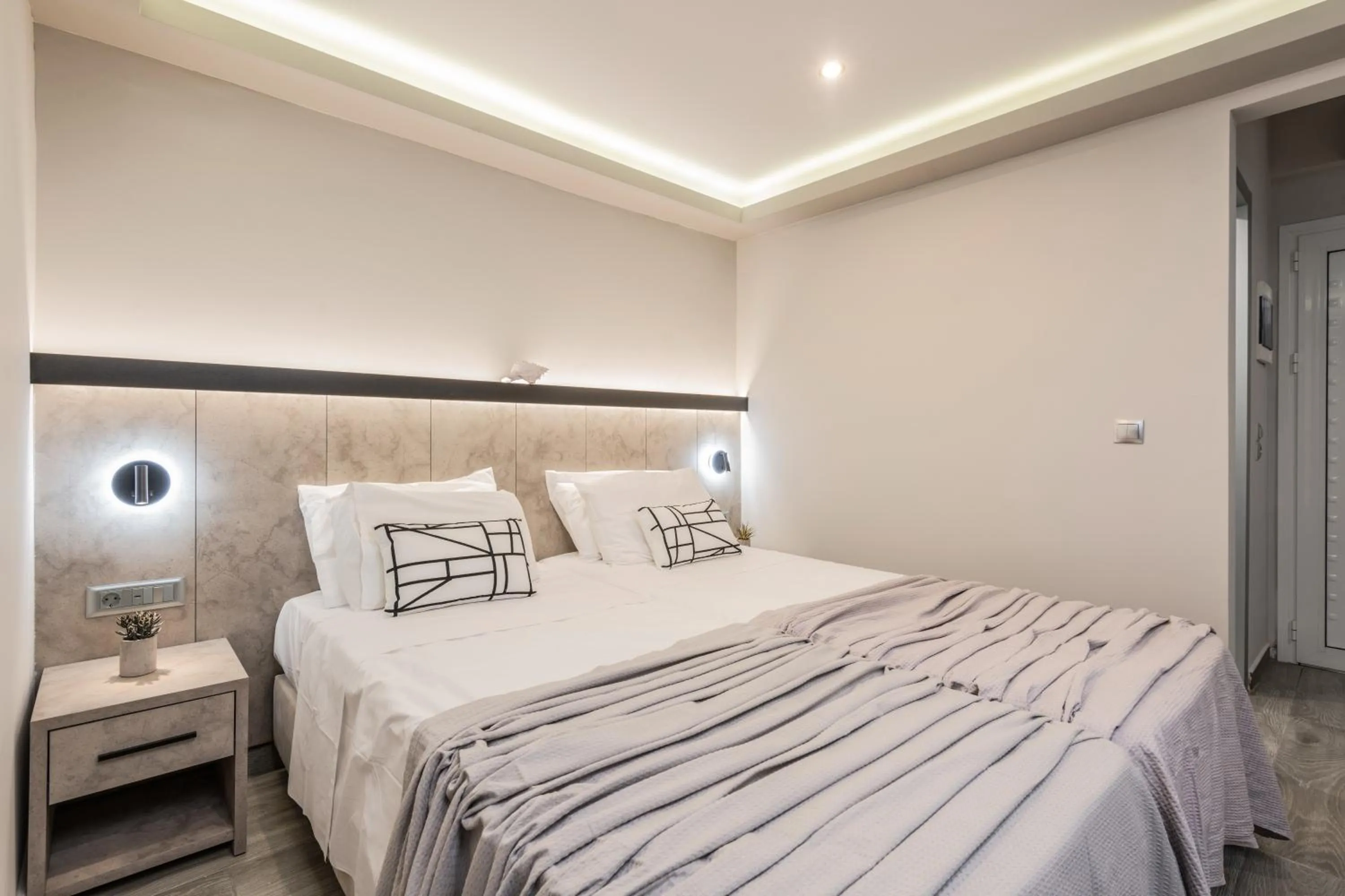 Bed in Callinica Hotel