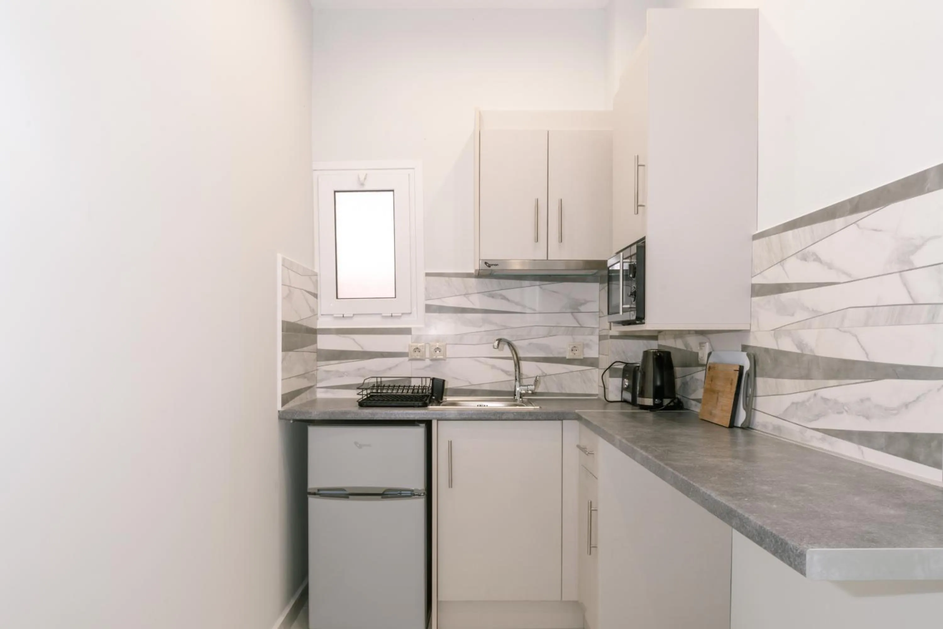 Kitchen or kitchenette in Callinica Hotel