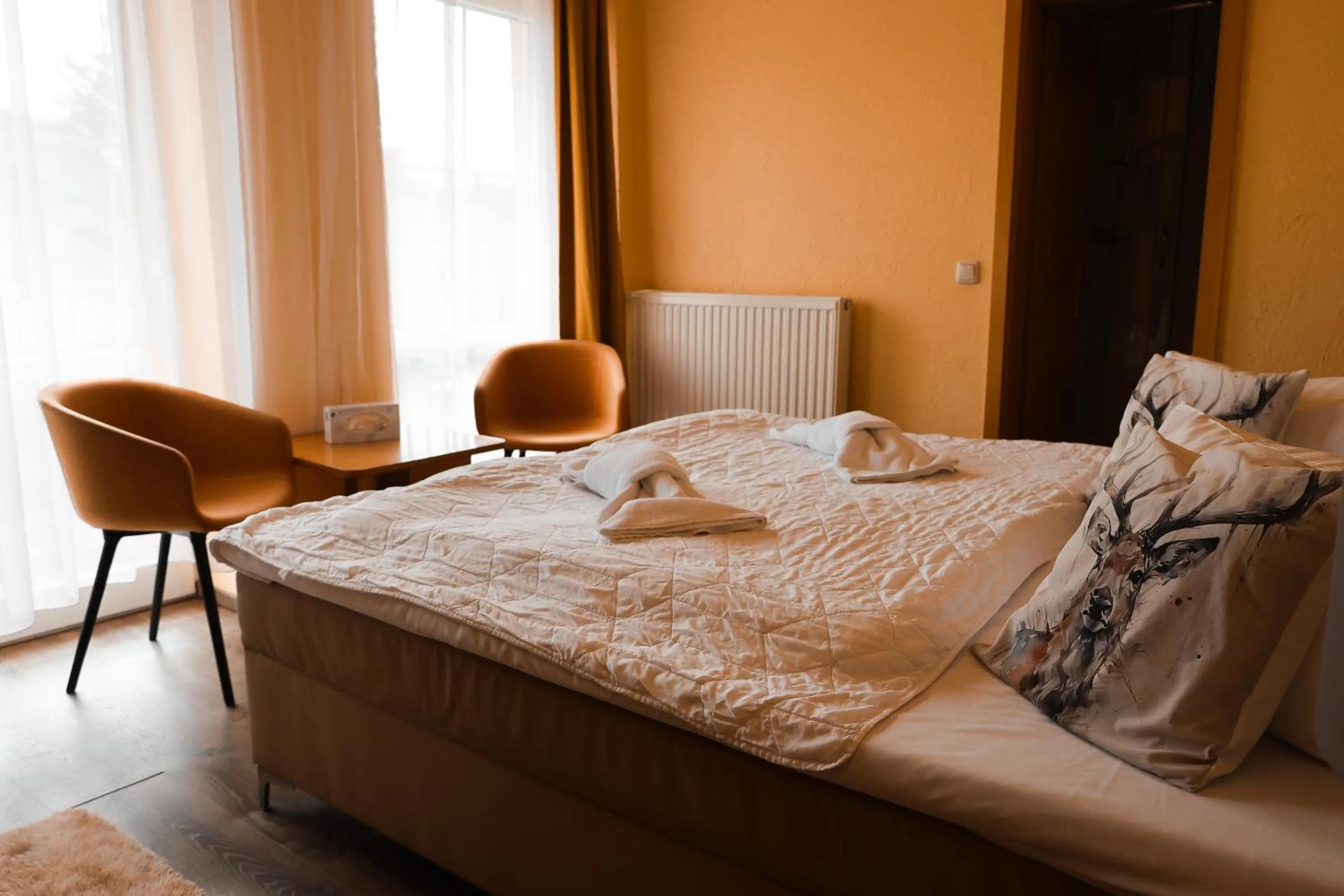 Bed in Strandhotel Vier Jahreszeiten Buckow