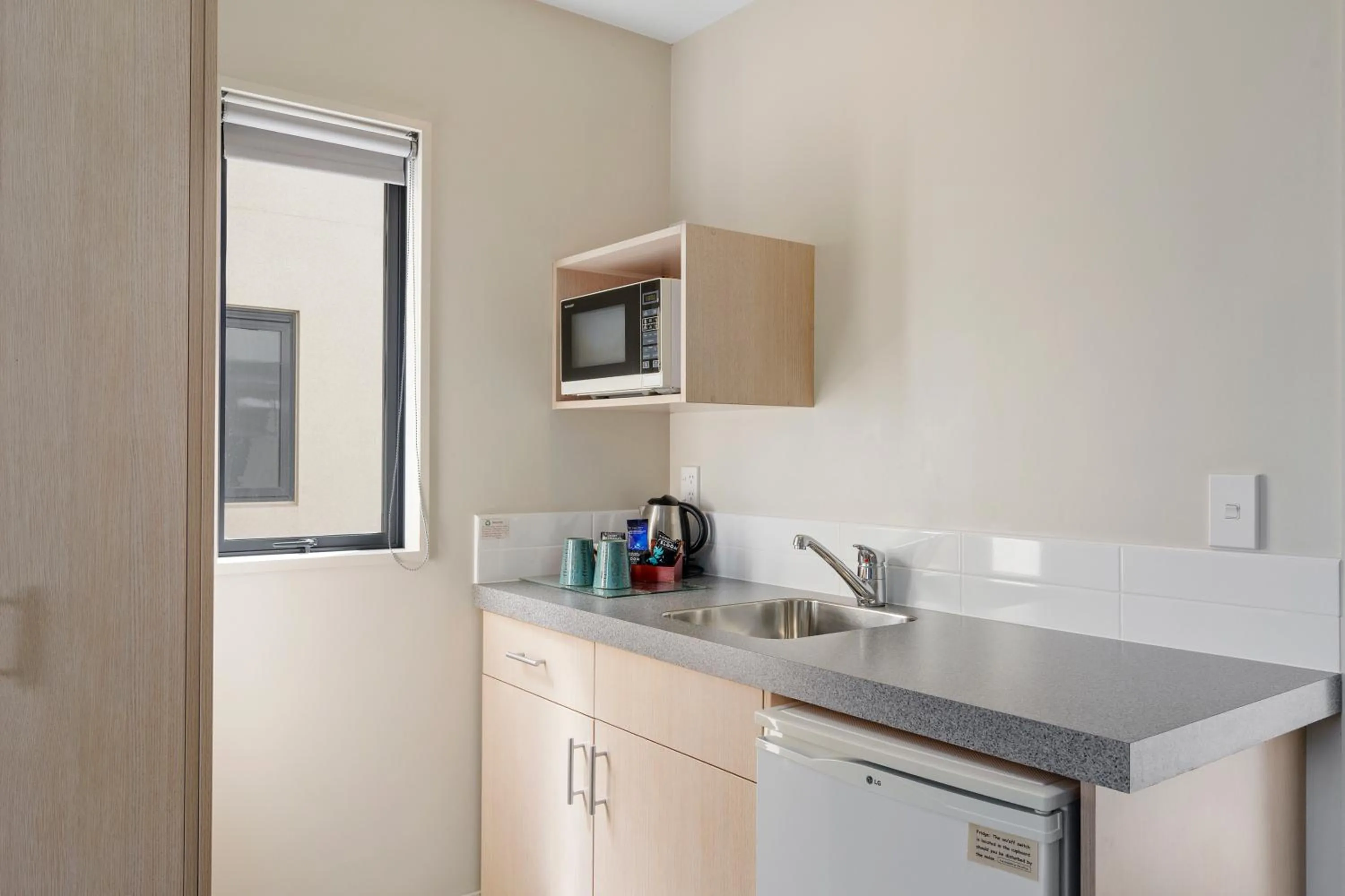 Kitchen or kitchenette in Bella Vista Motel Ashburton