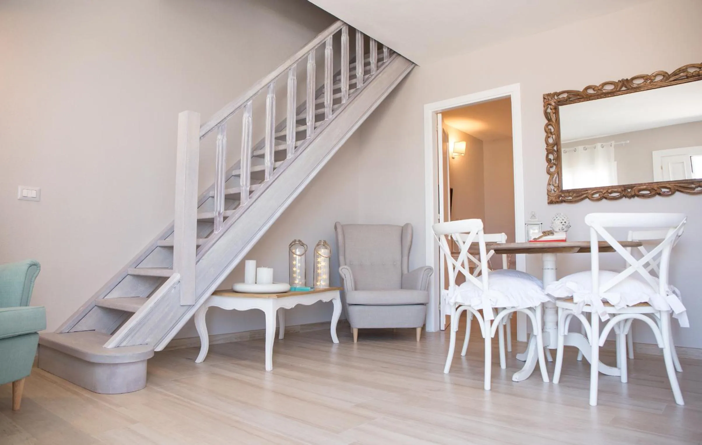 Communal lounge/ TV room in Le Saline Suites