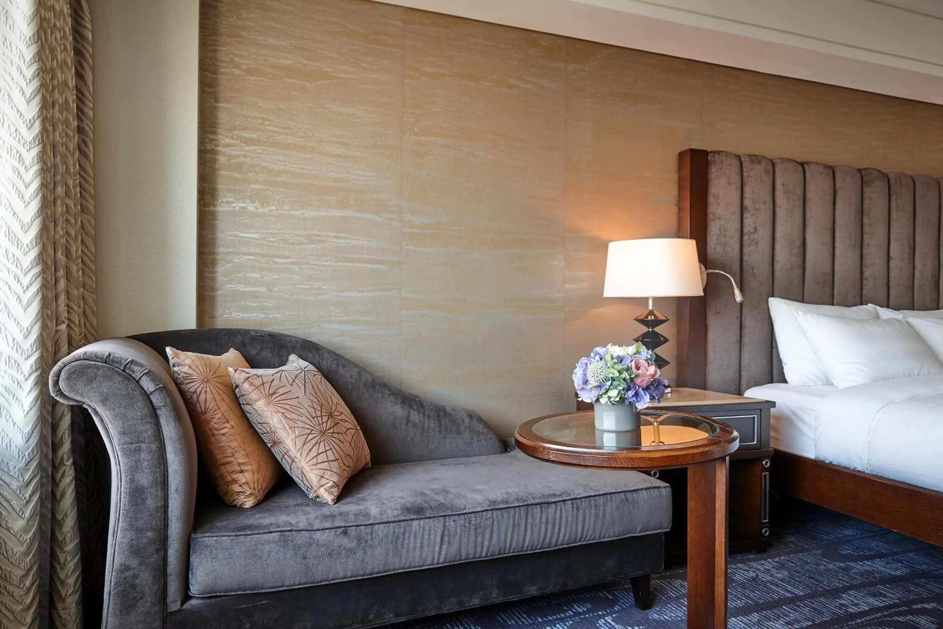 Seating area, Bed in Lotte Hotel Busan