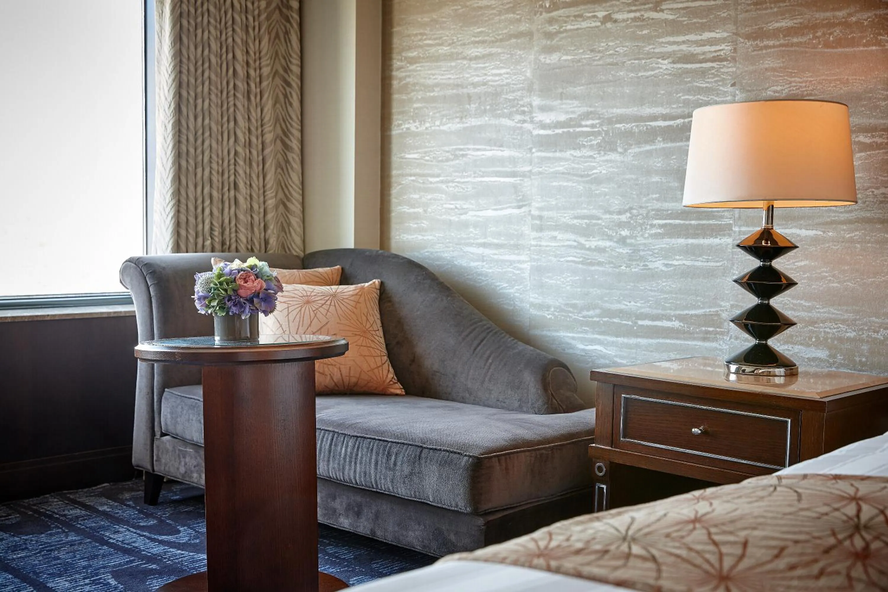 Seating area, Bed in Lotte Hotel Busan