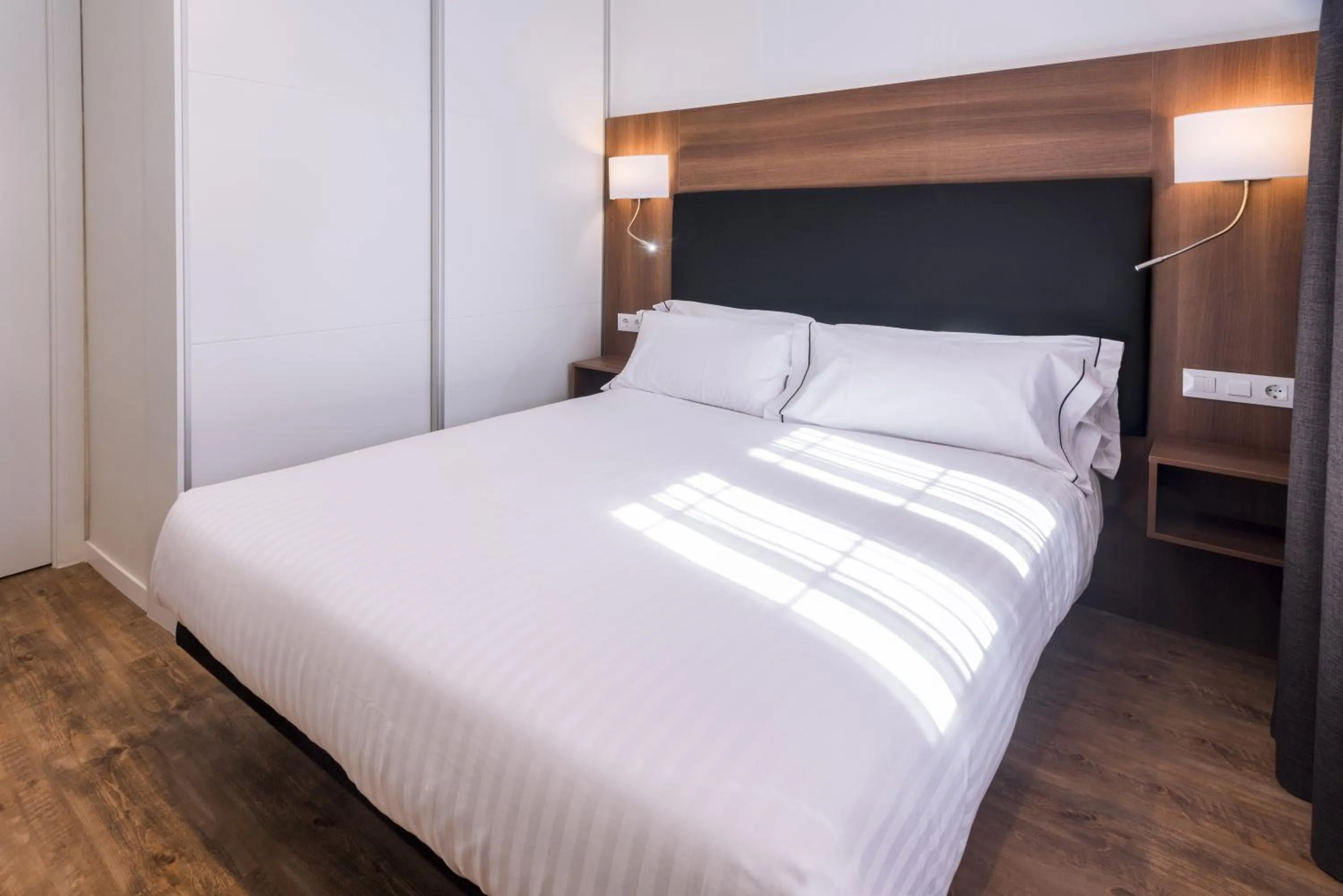 Bed in Apartments Playa de Castelldefels