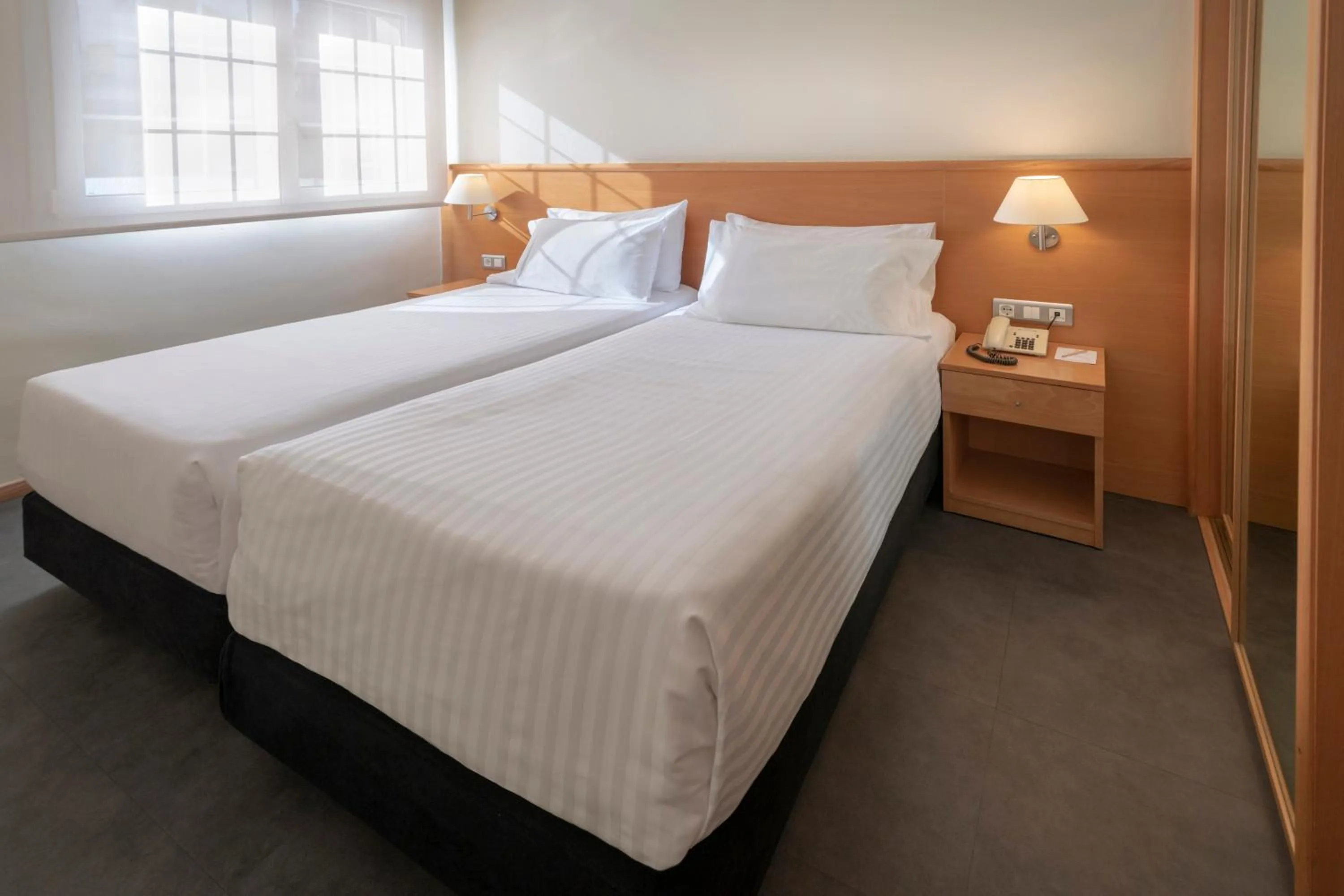 Bed in Apartments Playa de Castelldefels