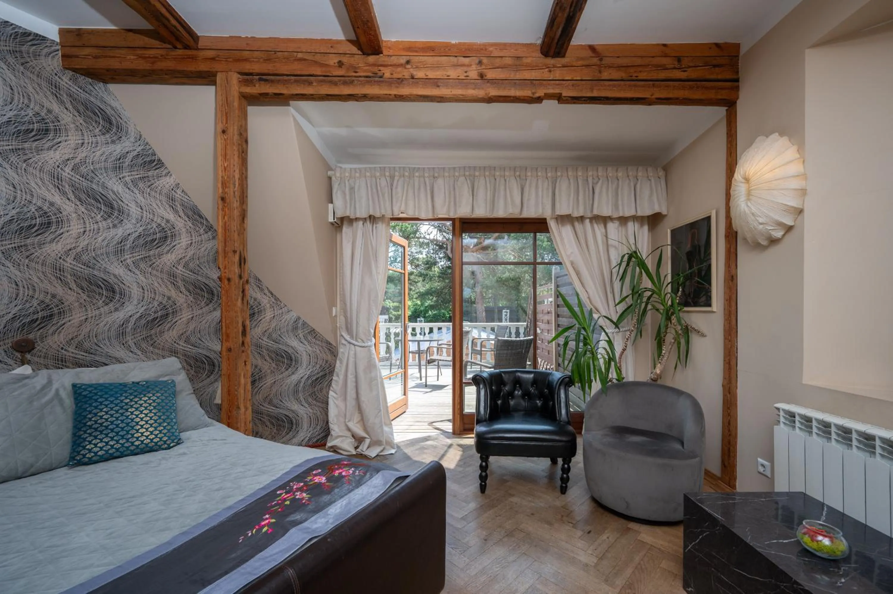 Bed in Paivilla Boutique Hotel