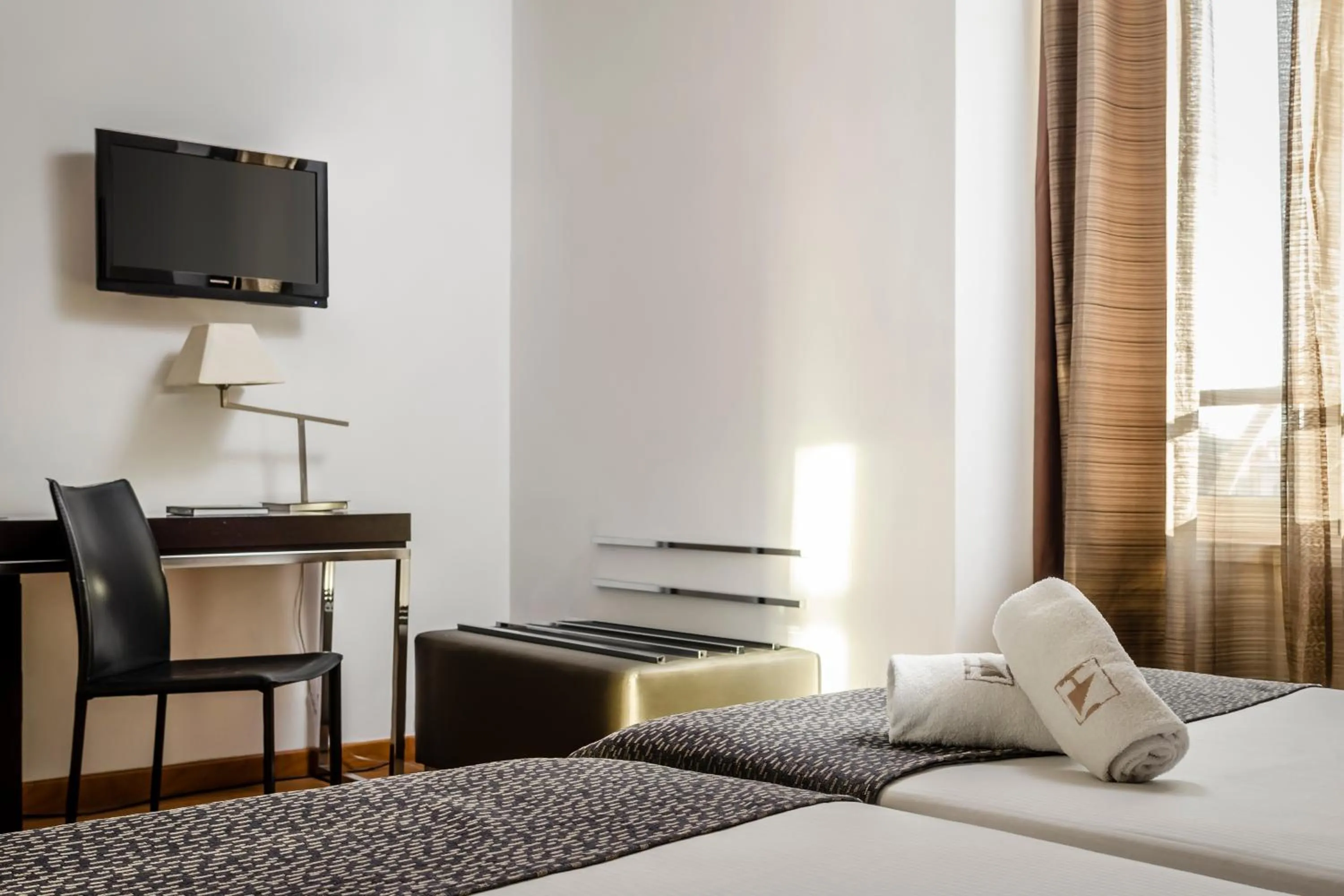 Bed in Eurostars Roma Aeterna