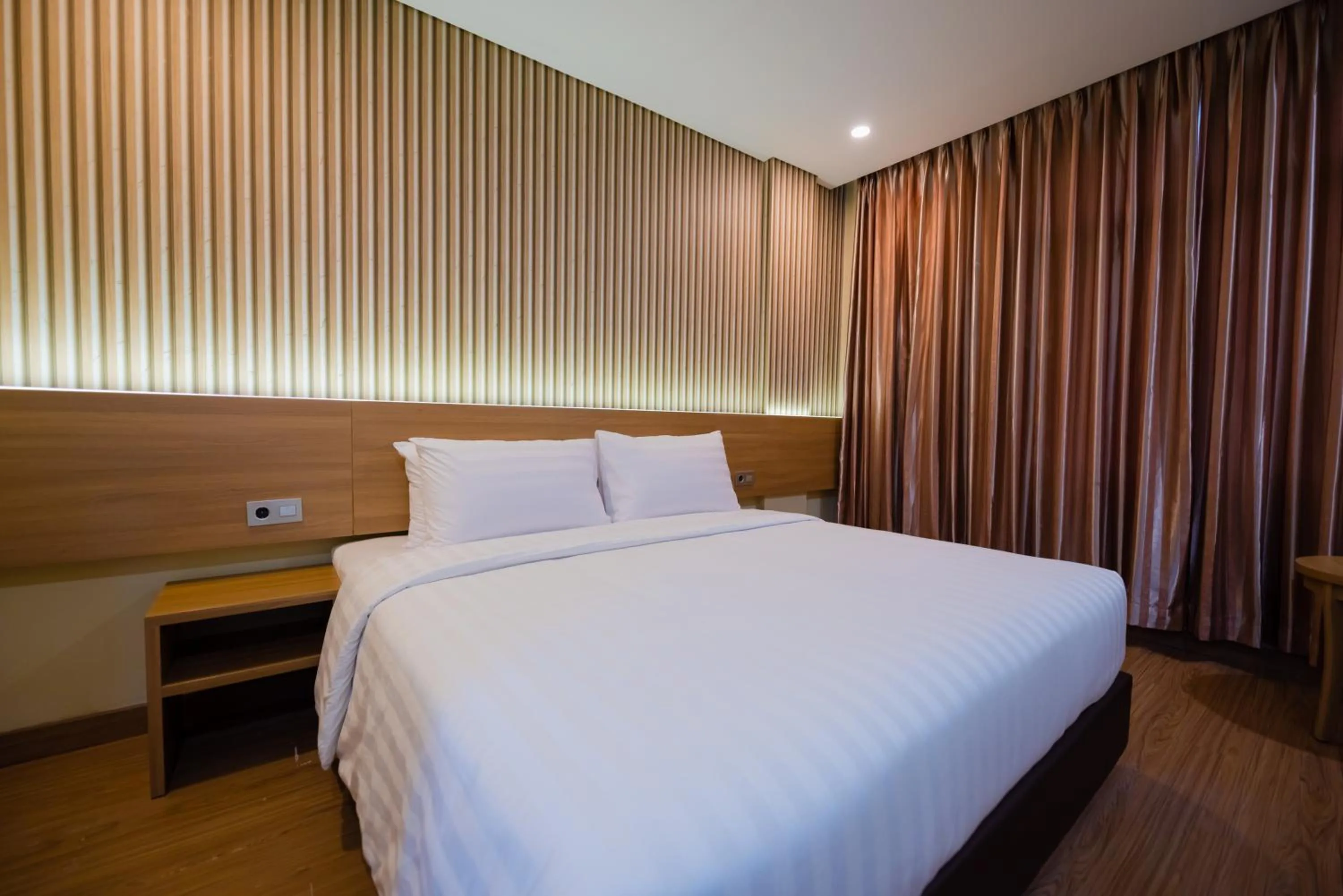 Bed in Grand Pasundan Convention Hotel