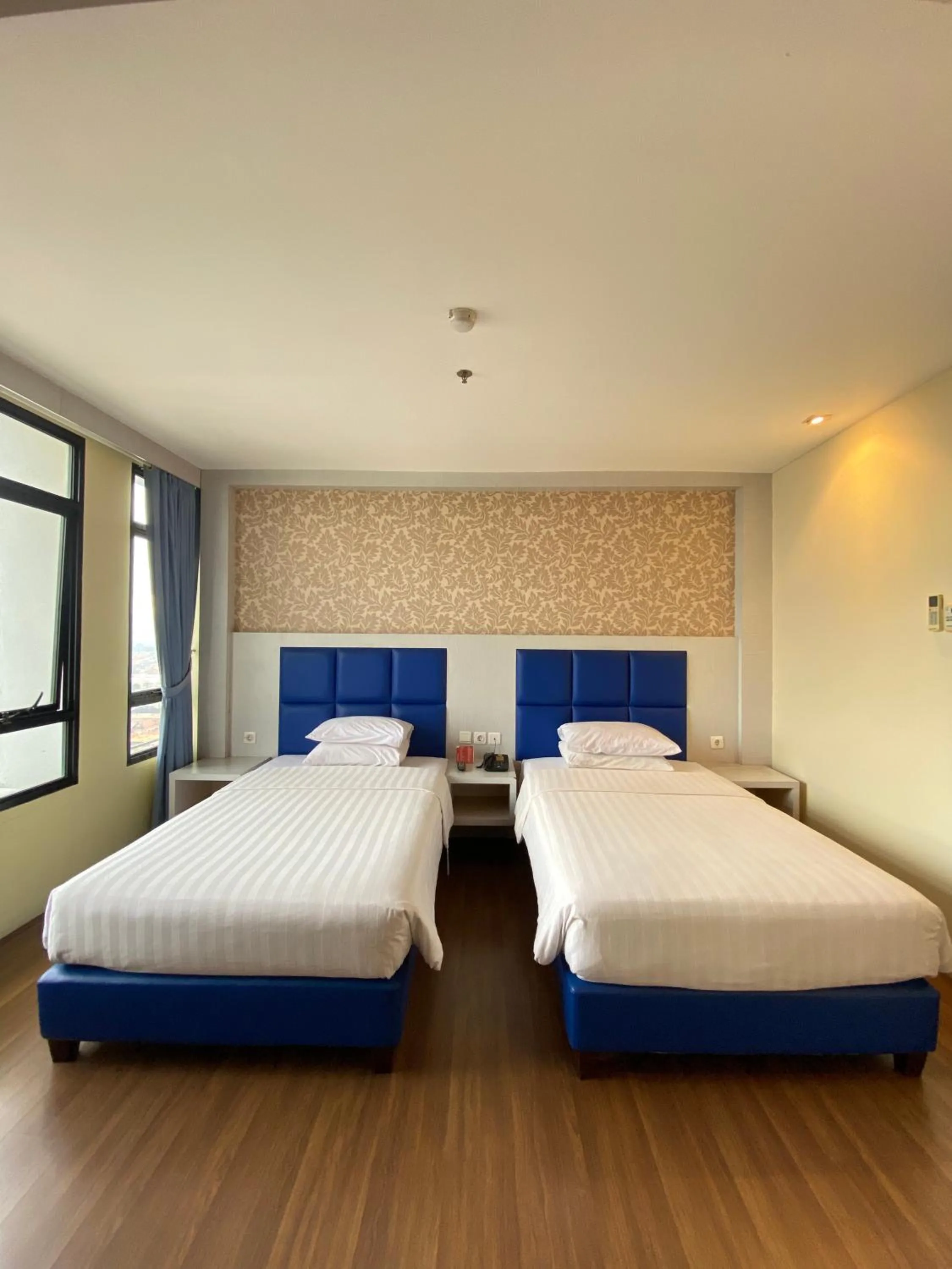 Bed in Grand Pasundan Convention Hotel