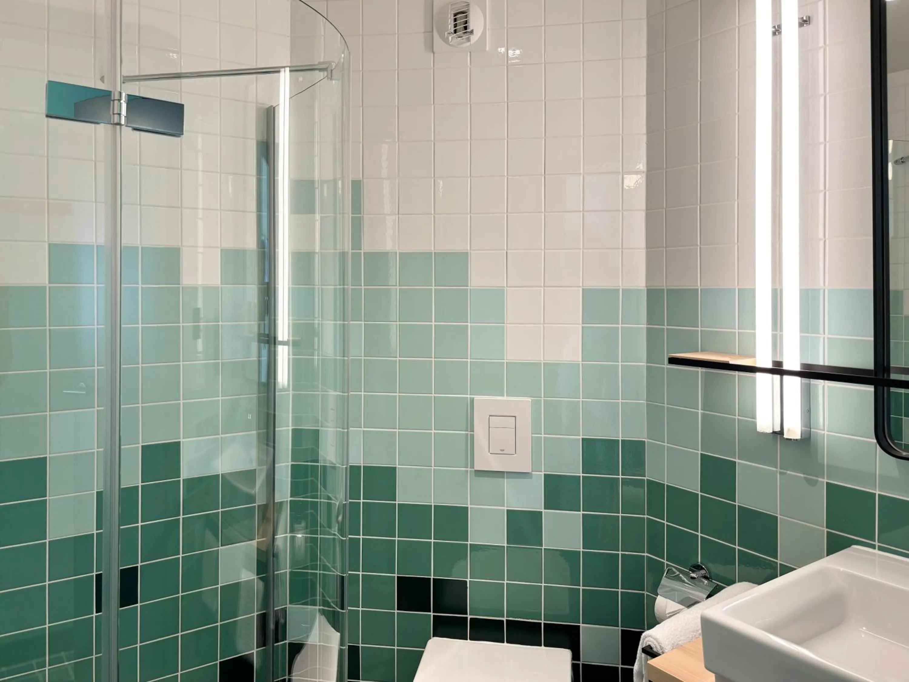 Bathroom in Nonanteneuf appart hōtel Sierre - contactless check-in