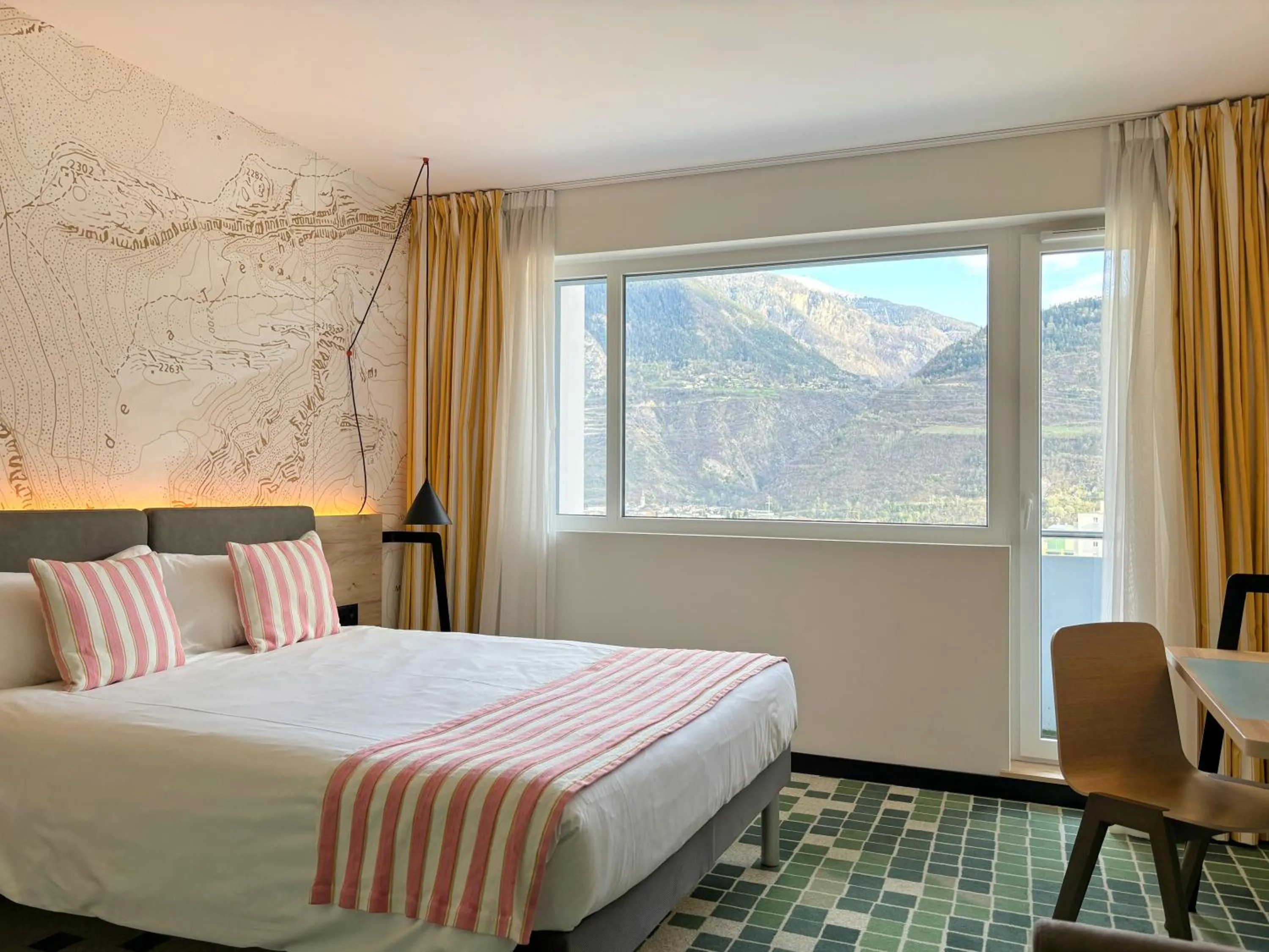 Bed in Nonanteneuf appart hōtel Sierre - contactless check-in