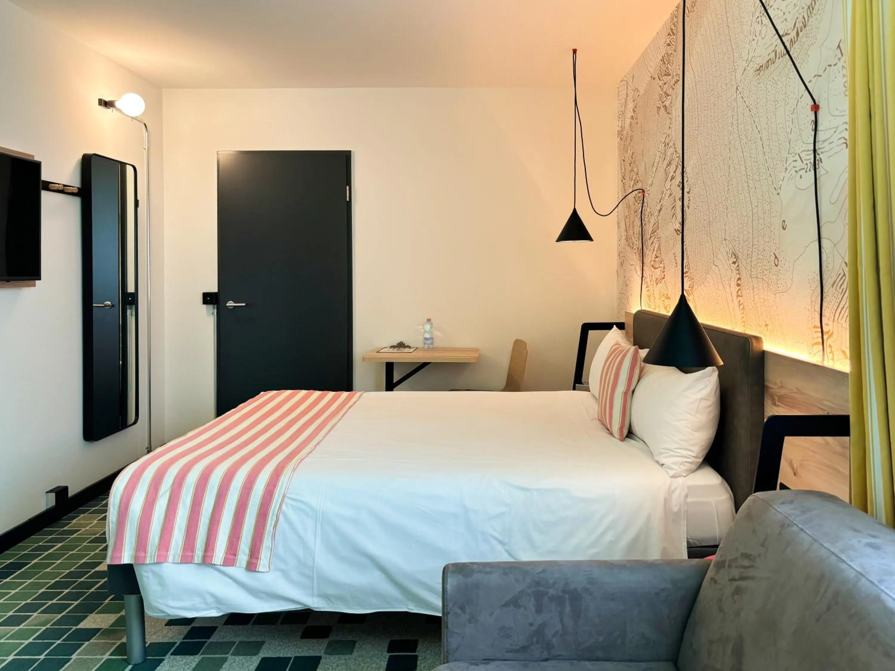 Bed in Nonanteneuf appart hōtel Sierre - contactless check-in