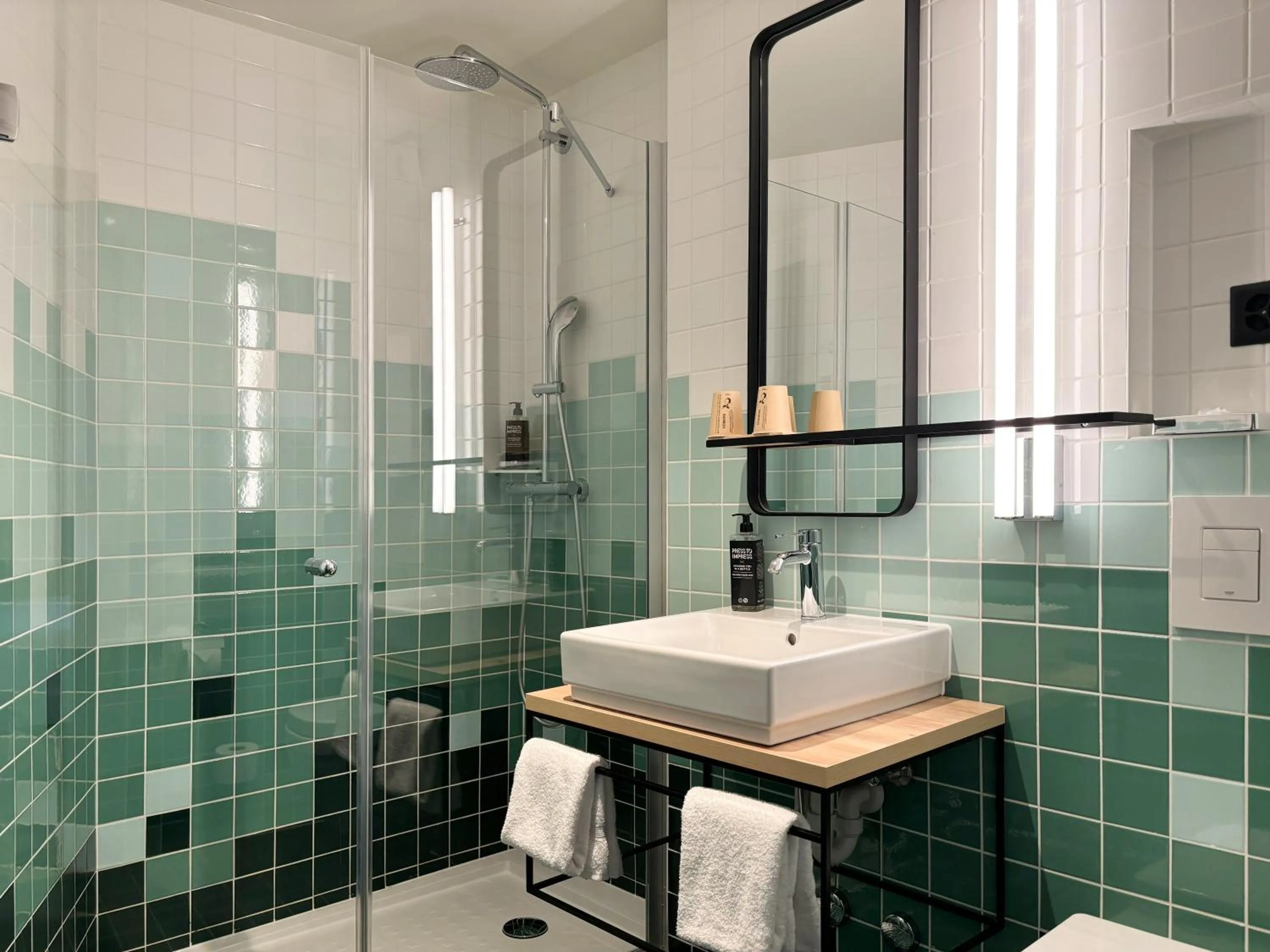 Bathroom in Nonanteneuf appart hōtel Sierre - contactless check-in