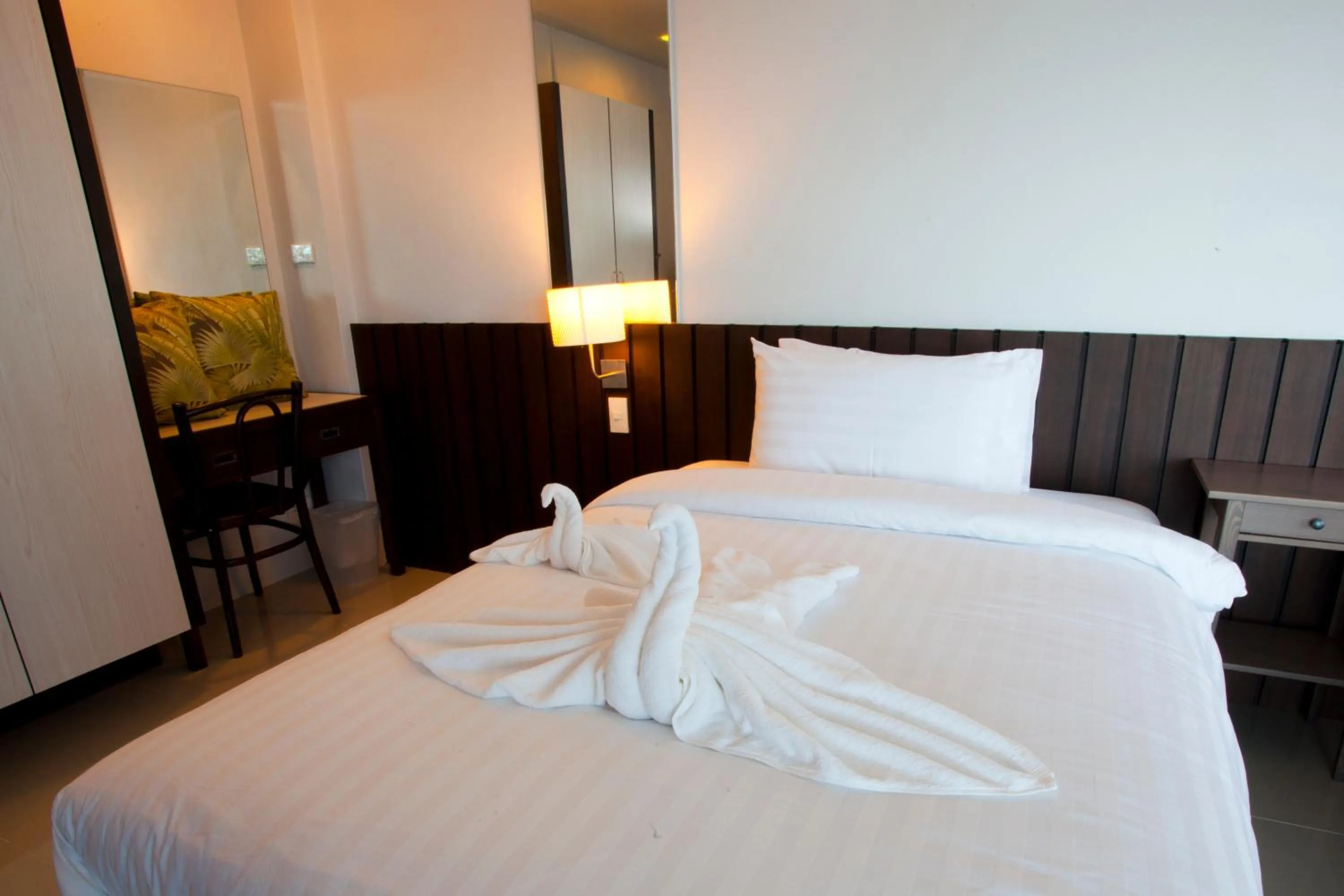 Bed in Prasarnsook Villa Beach Resort