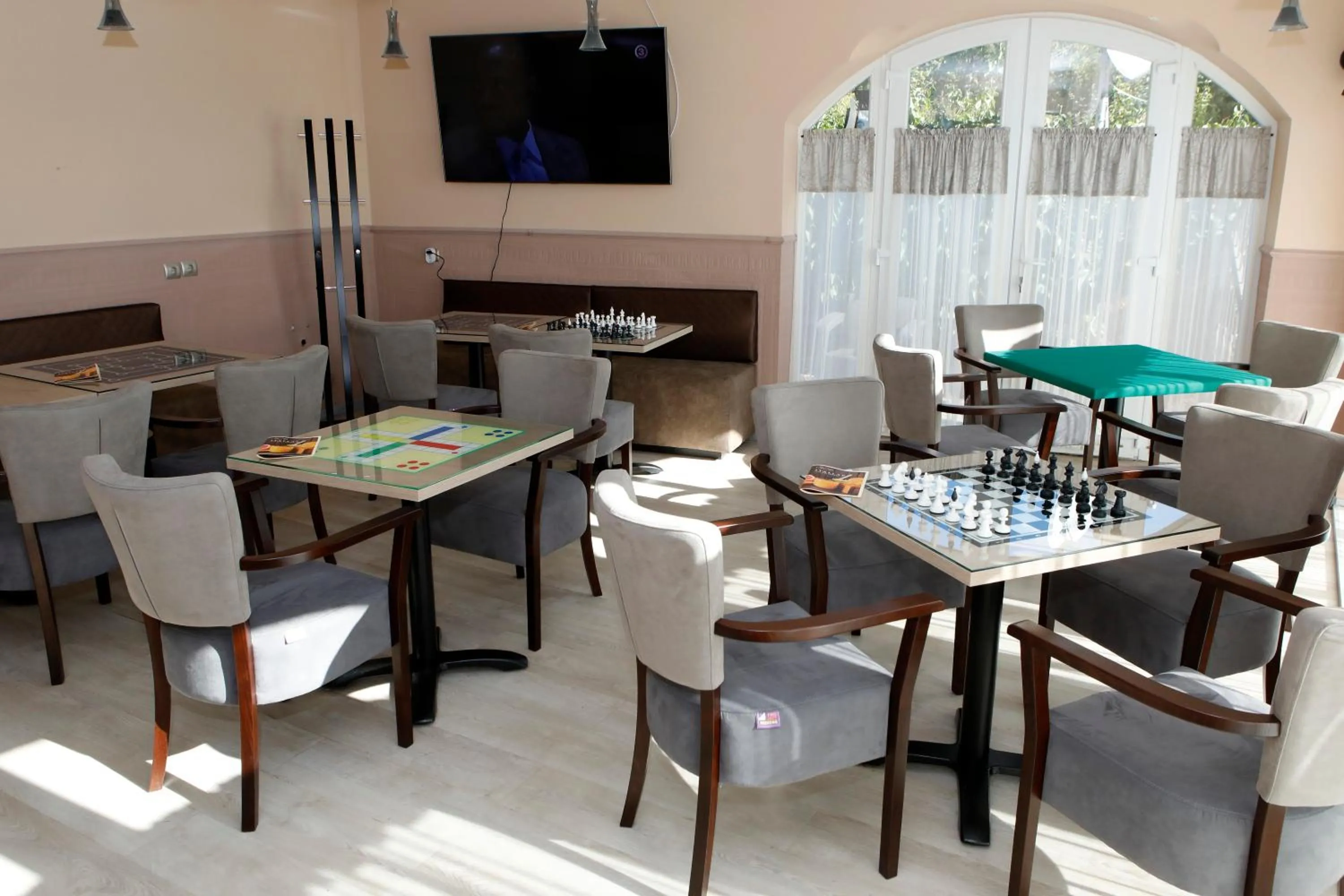 Communal lounge/ TV room in Wellness Hotel Laroba