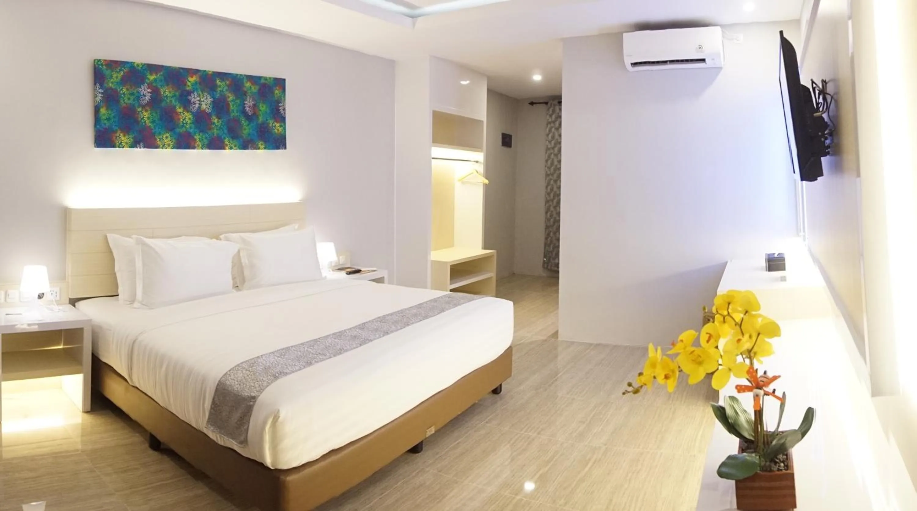 Bed in Grand Harvest Resort & Villas