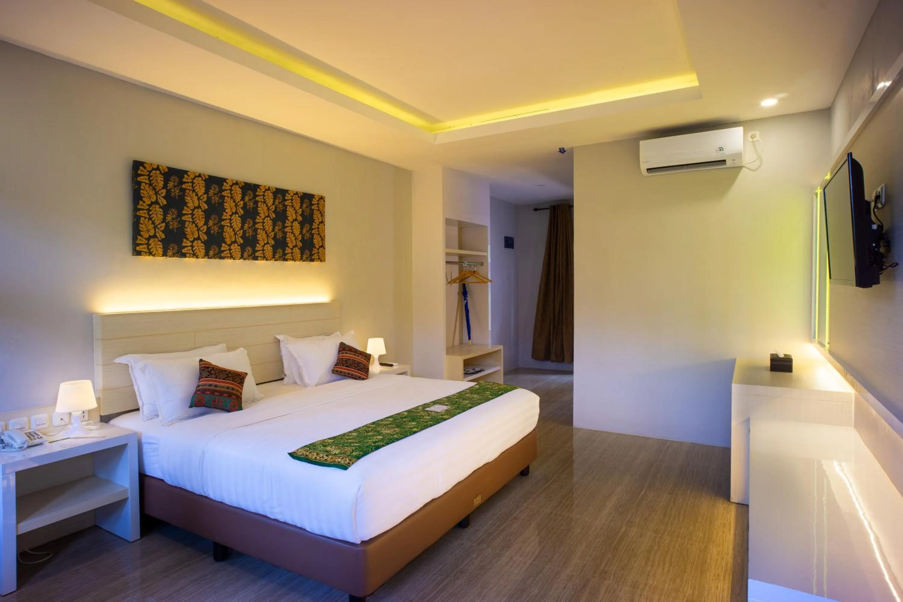 Bed in Grand Harvest Resort & Villas