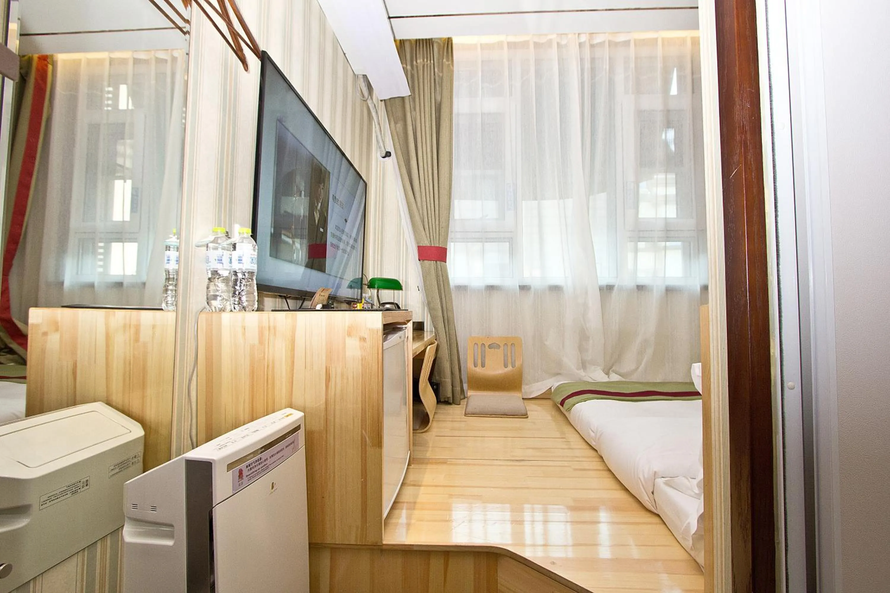 Photo of the whole room, Bed in Qingdao MG Hotel l Walking distance to the beach & railway station & St Michaels Cathedral