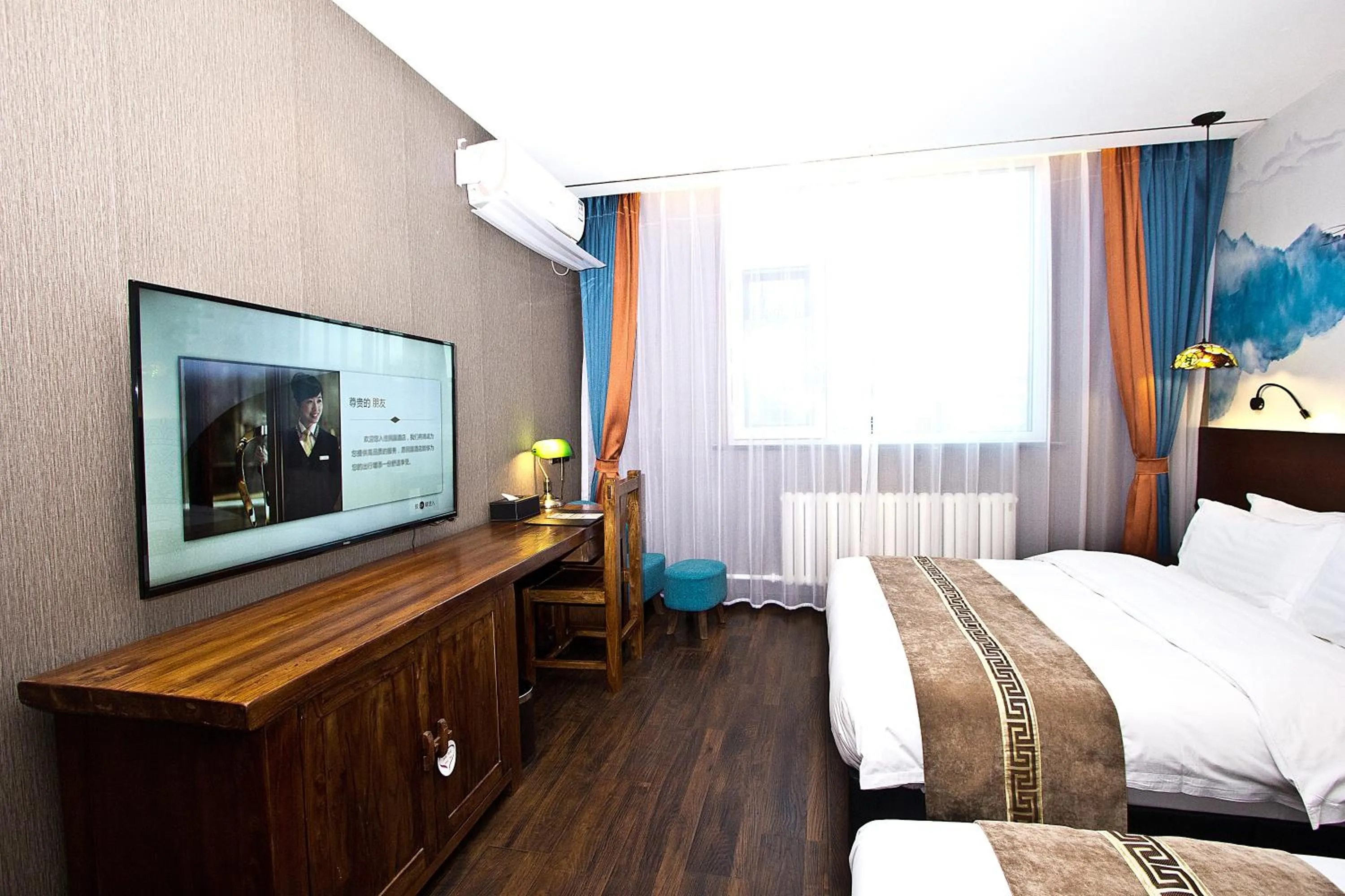 TV and multimedia, Bed in Qingdao MG Hotel l Walking distance to the beach & railway station & St Michaels Cathedral