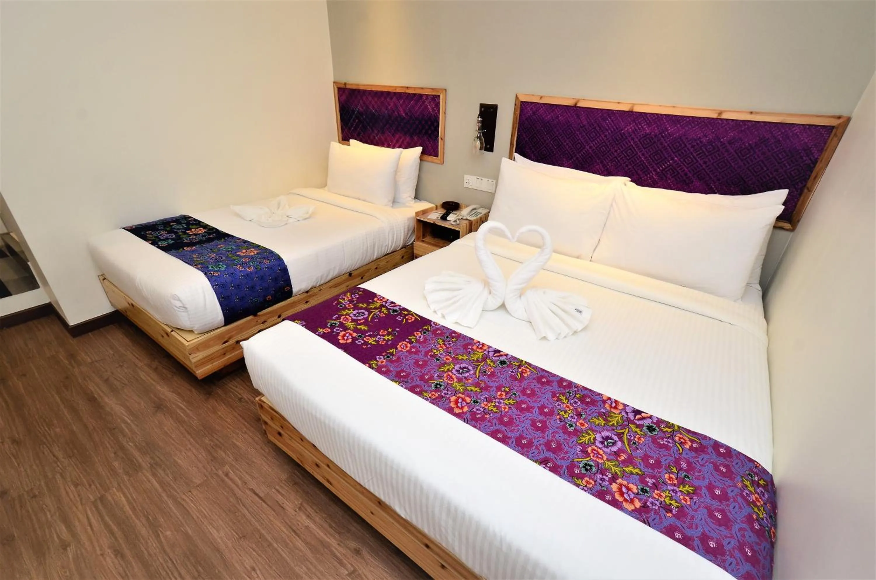 Bed in Artisan Eco Hotel