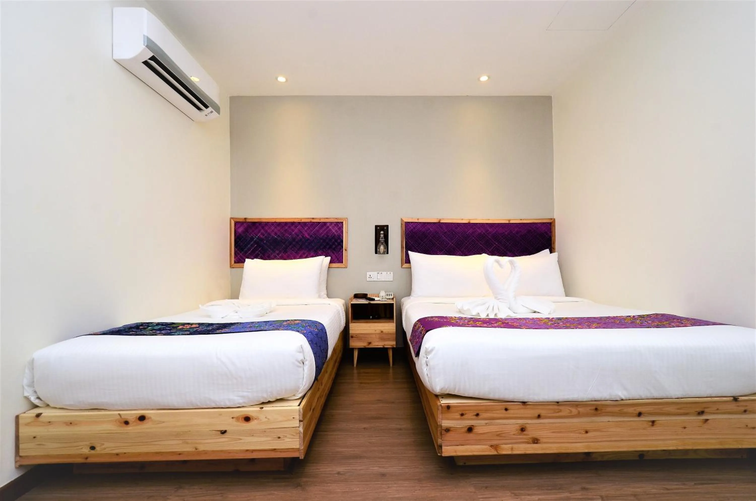Bed in Artisan Eco Hotel