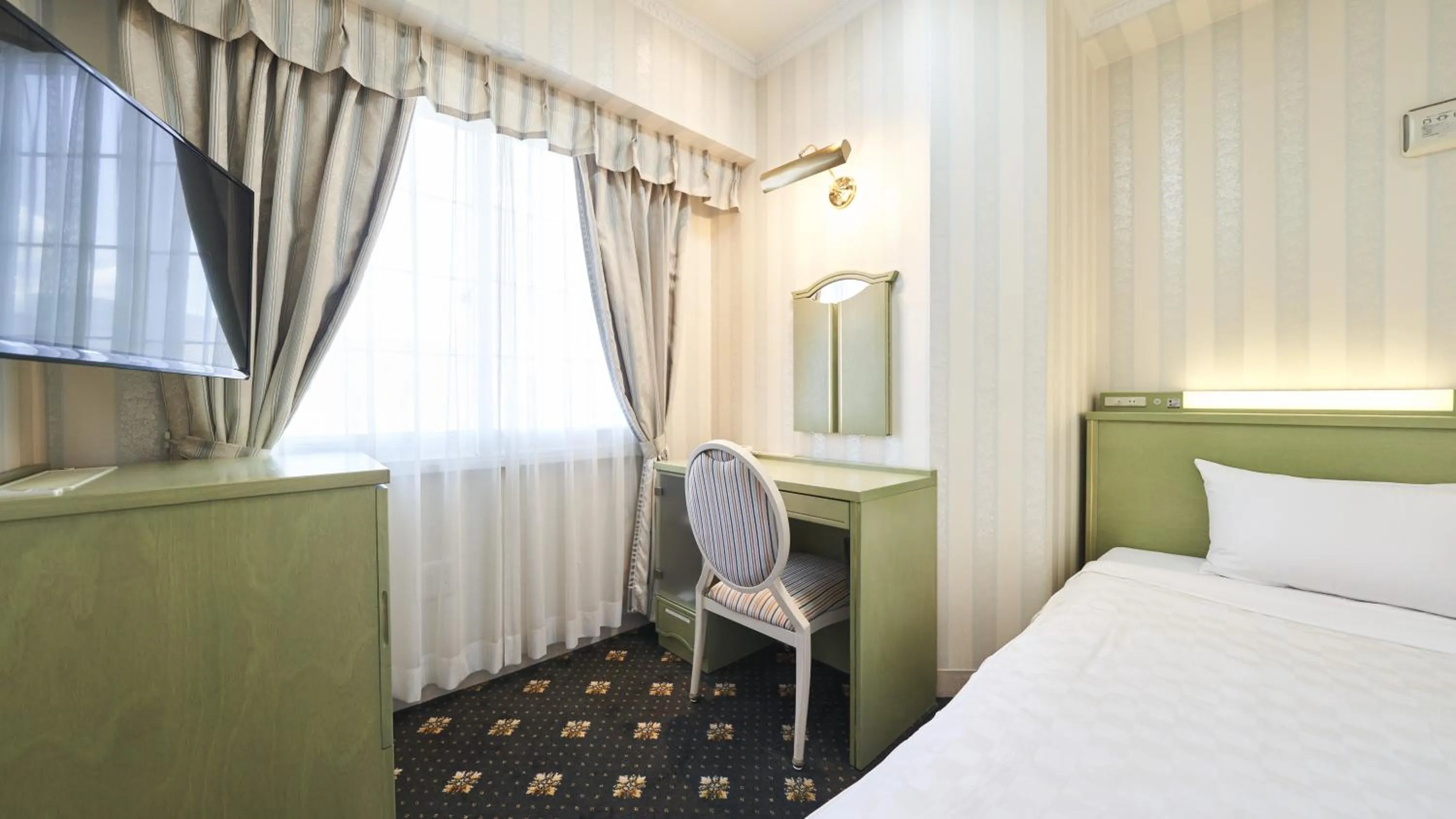 Photo of the whole room, Bed in Hotel Paco Obihiro Ekimae