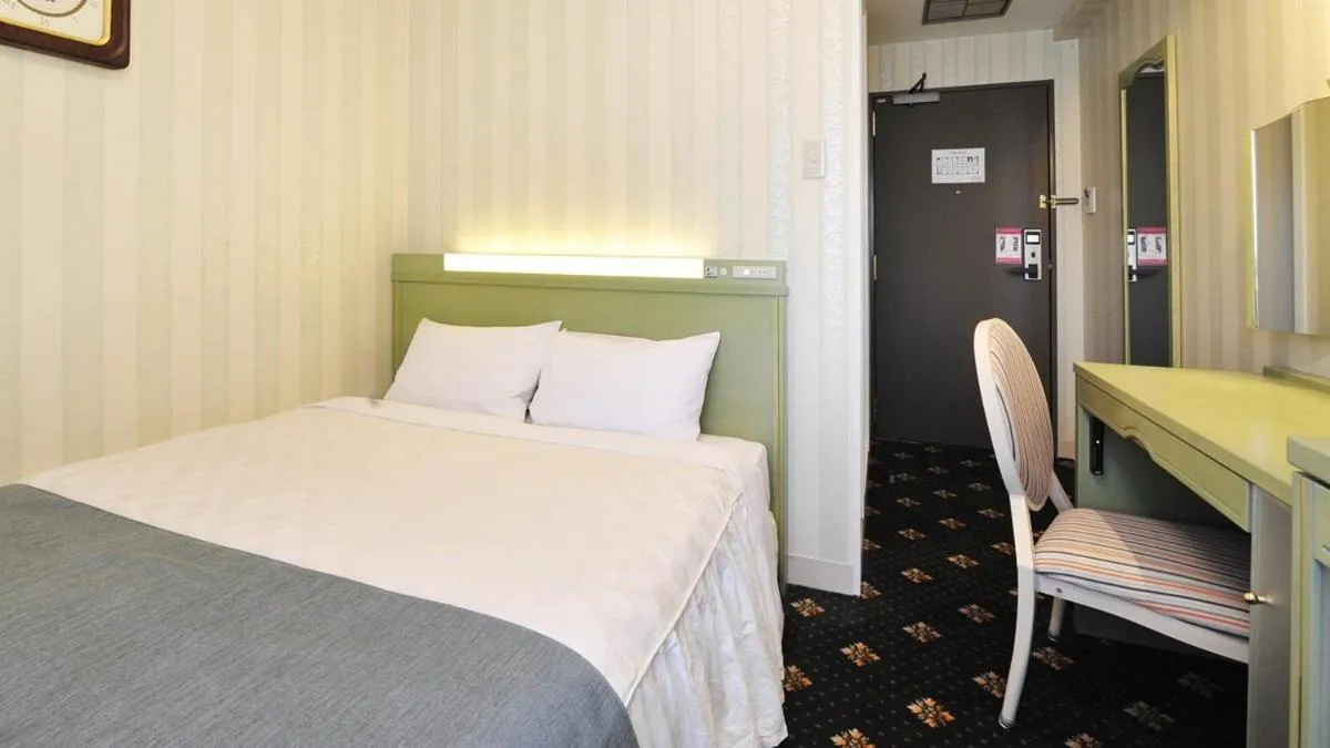 Photo of the whole room, Bed in Hotel Paco Obihiro Ekimae