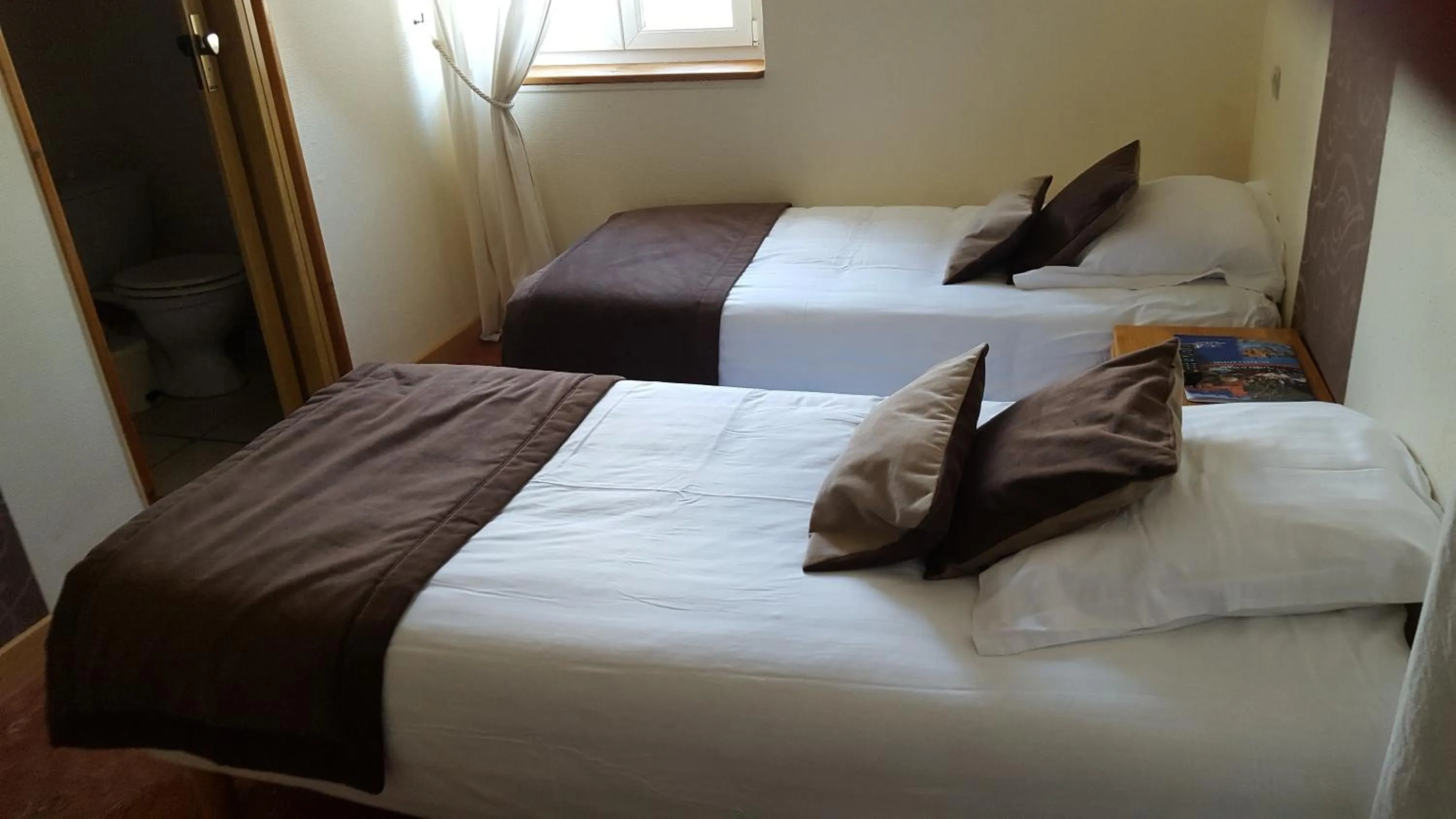 Bed in Hotel Ô Fil de L'ô