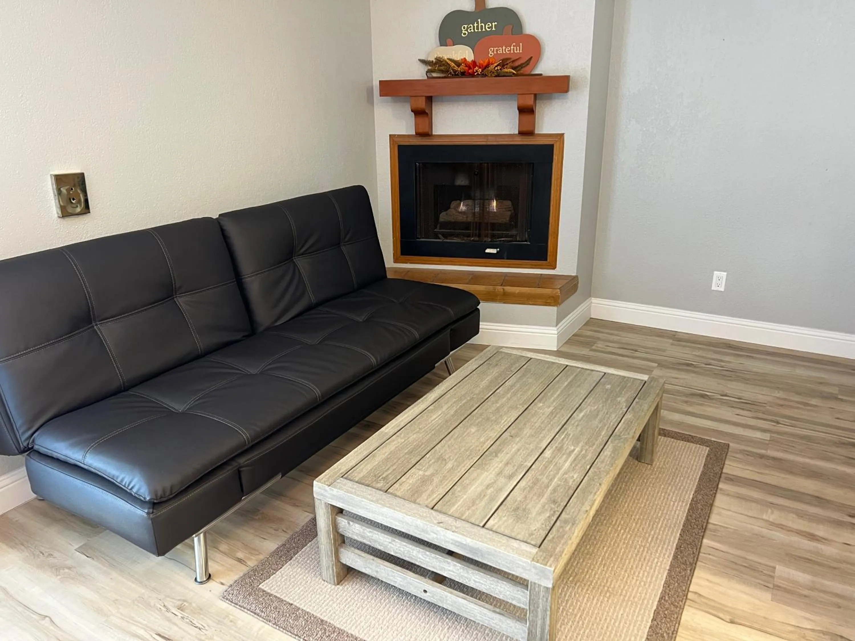 Living room in Pacific Coast Roadhouse - SureStay Collection by Best Western