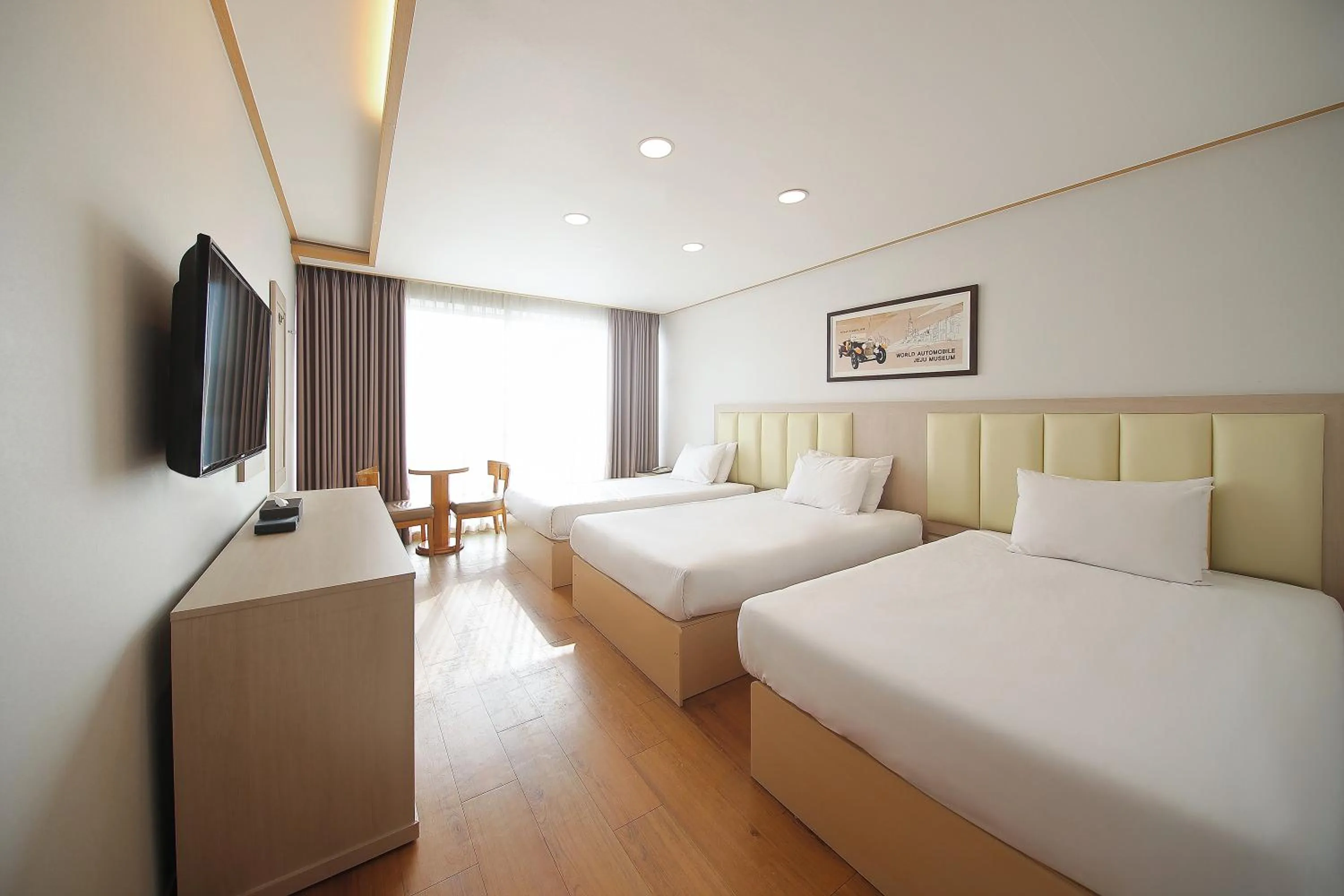 Bed in Shin Shin Hotel Jeju City